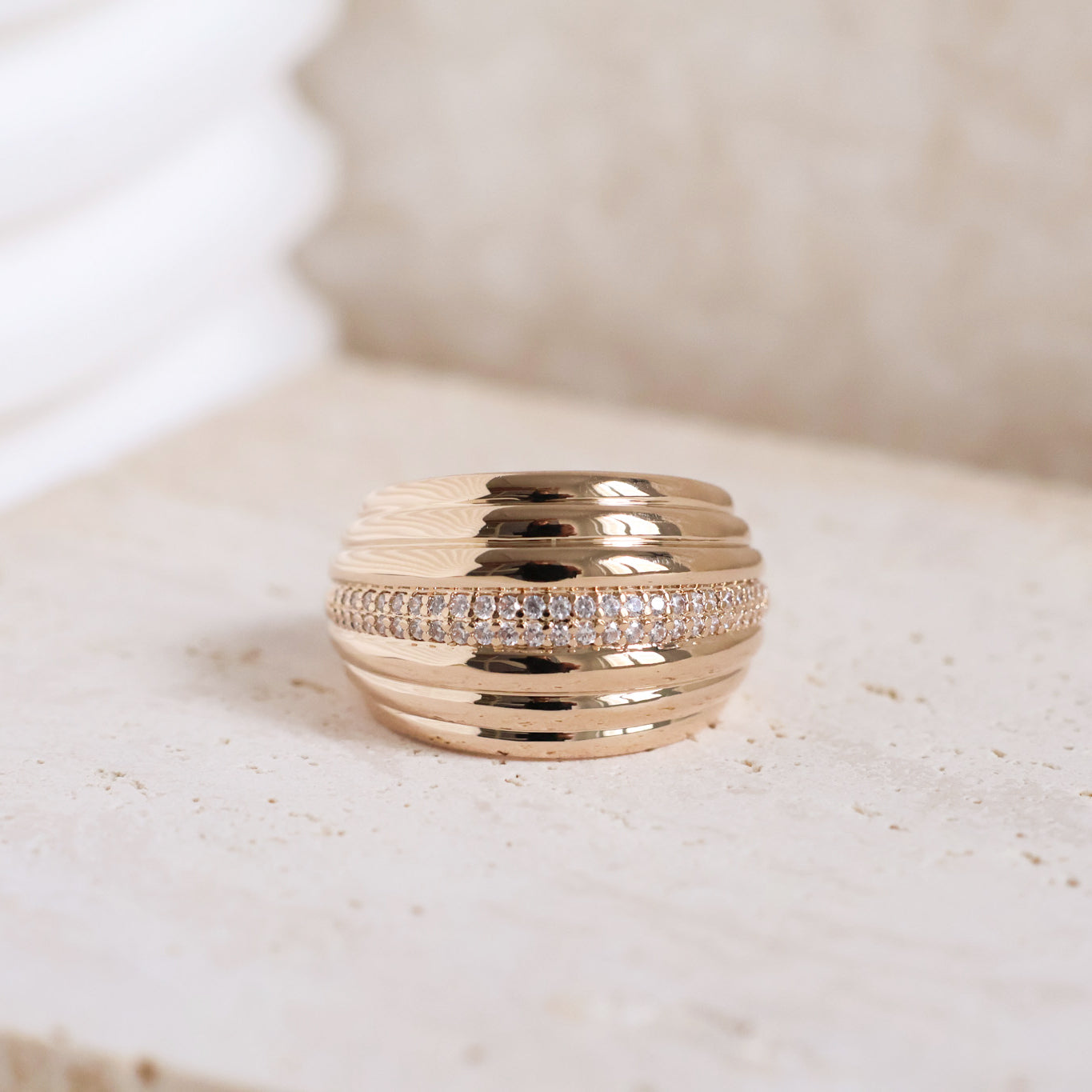 Capri ring wide draped with zircons gold plated