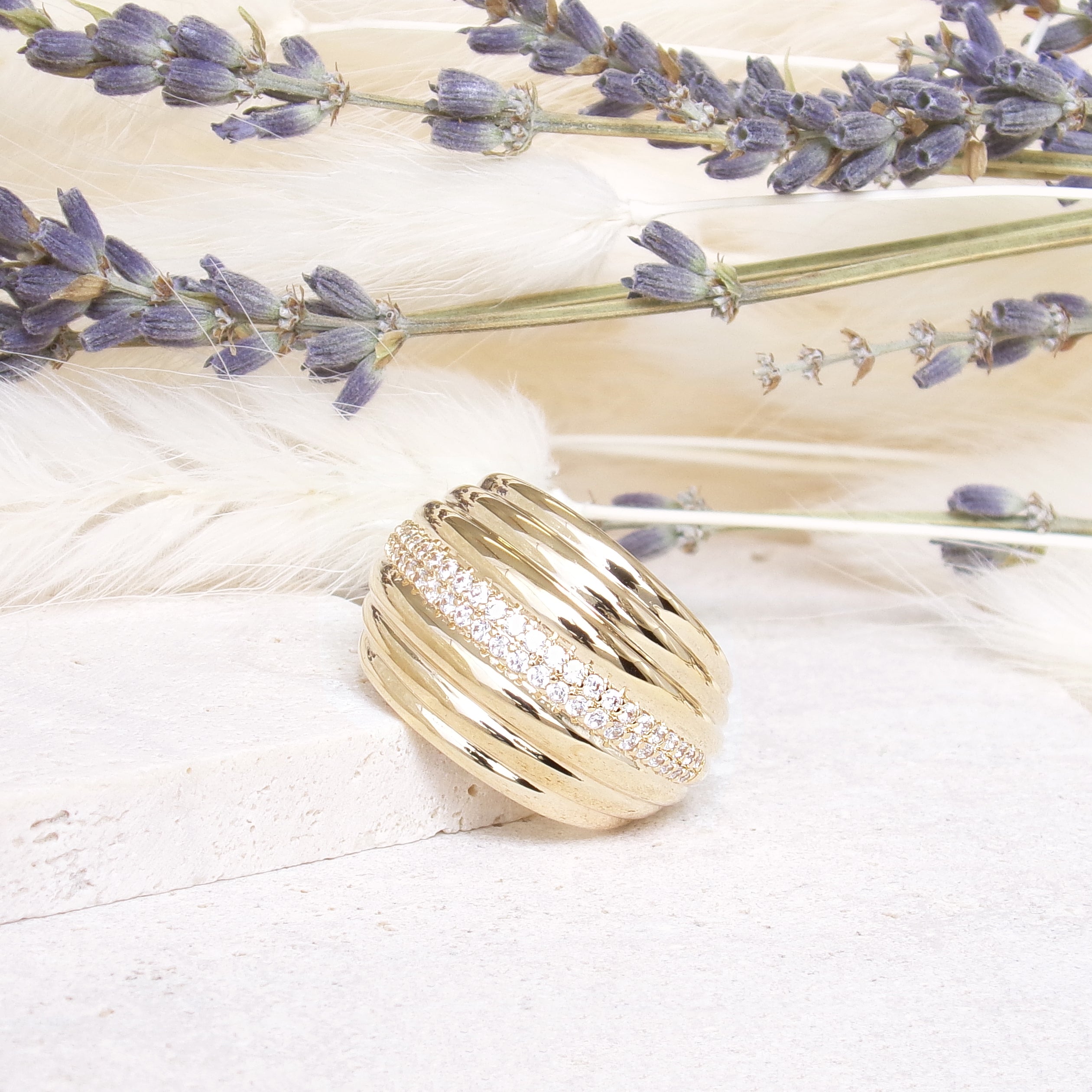 Capri ring wide draped with zircons gold plated