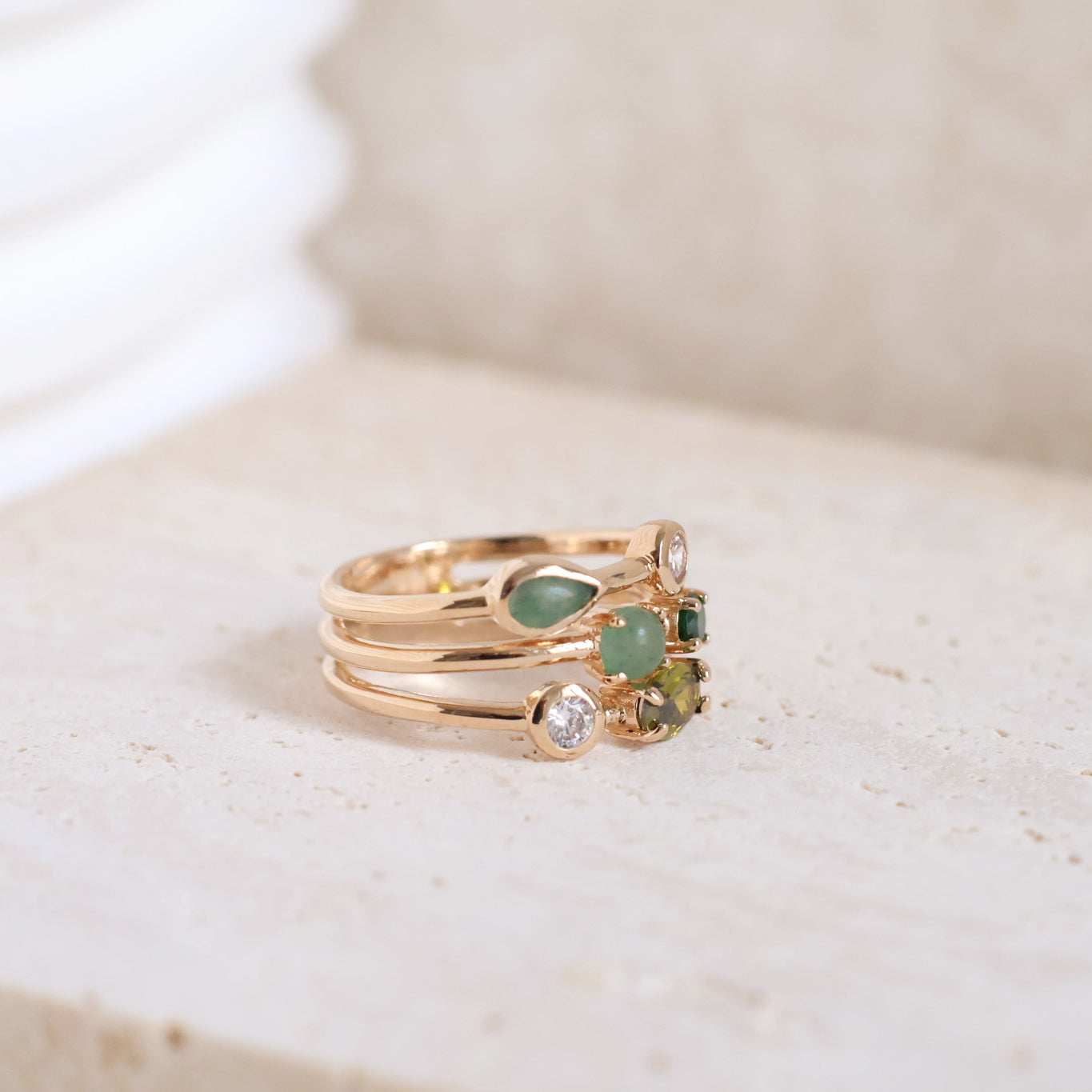 Anya ring three rows with white and green zircons gold plated