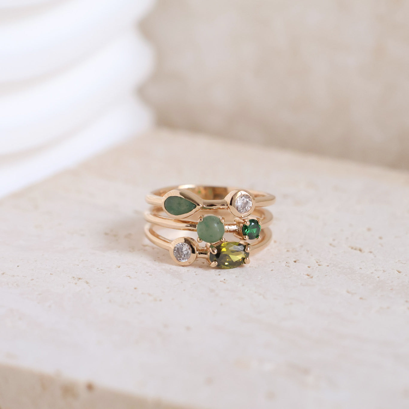 Anya ring three rows with white and green zircons gold plated