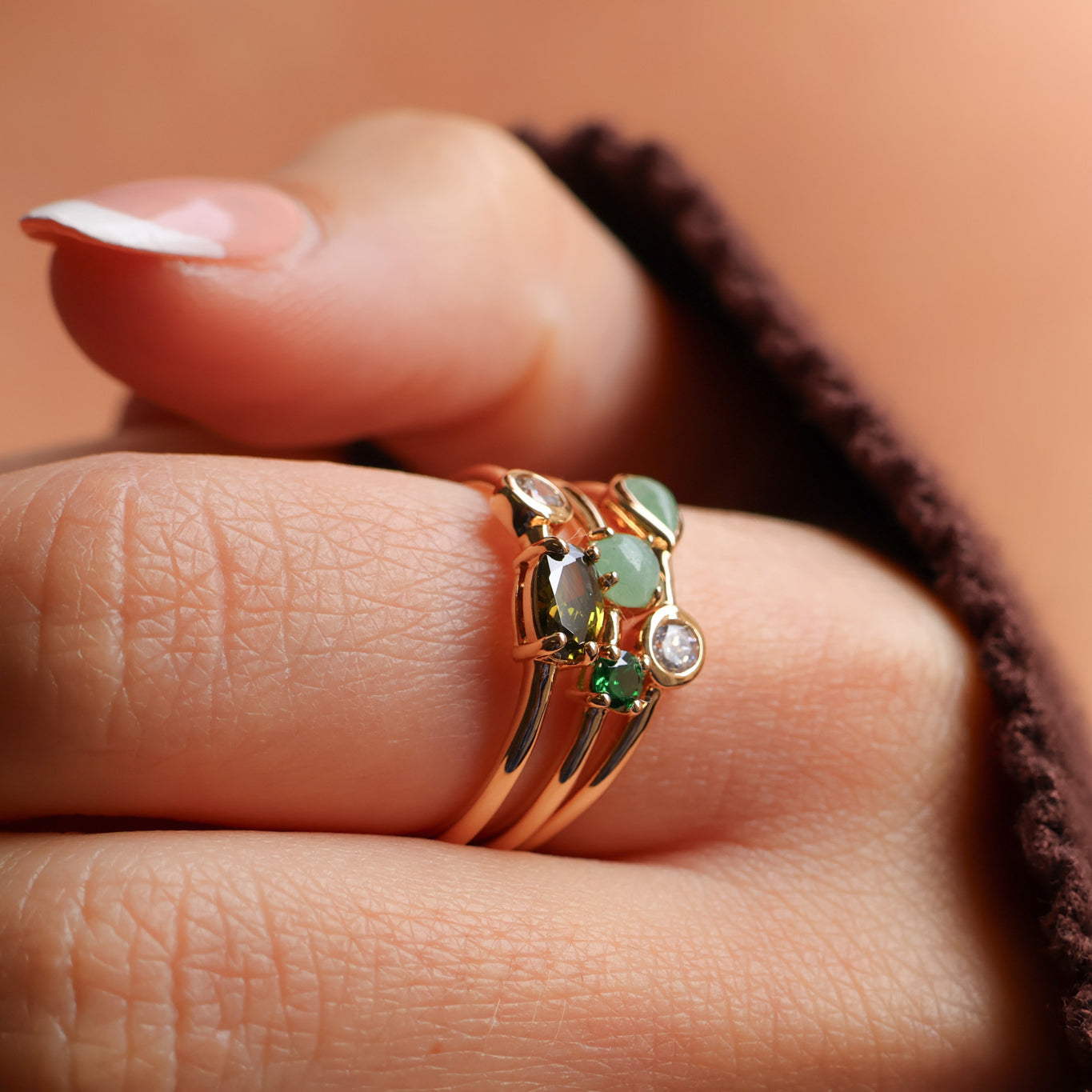 Anya ring three rows with white and green zircons gold plated