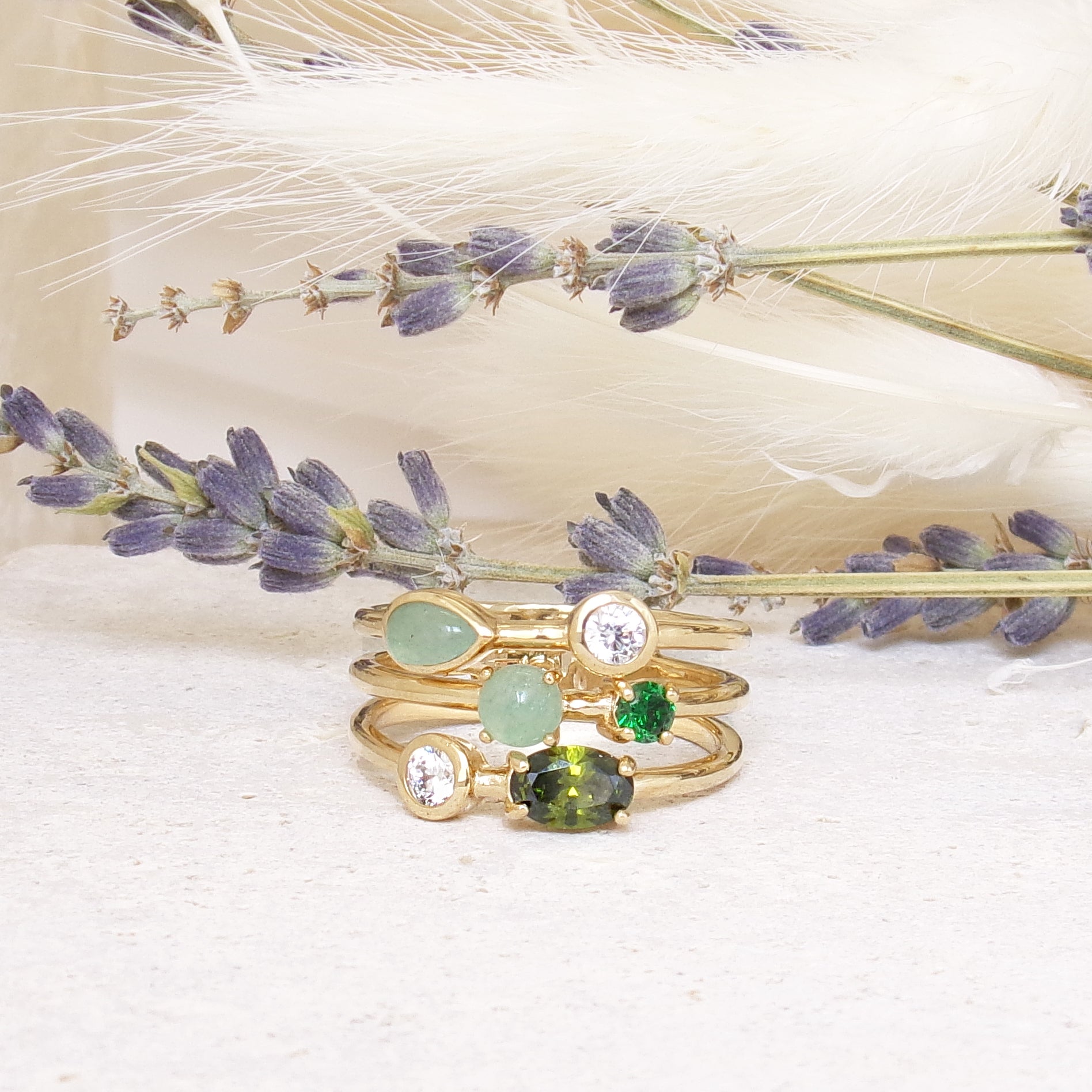 Anya ring three rows with white and green zircons gold plated
