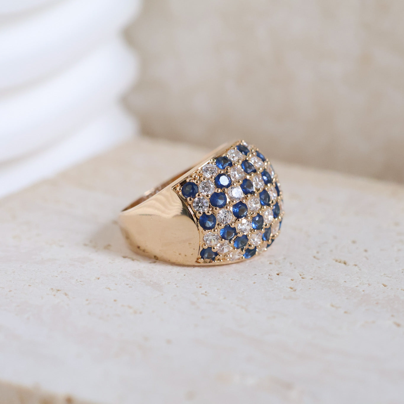 Nolita curved ring with white and blue zircons gold-plated