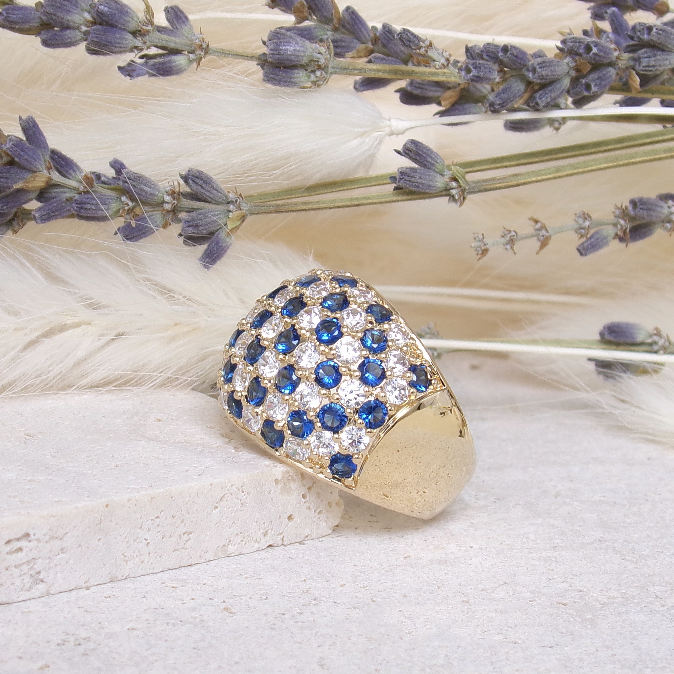 Nolita curved ring with white and blue zircons gold-plated