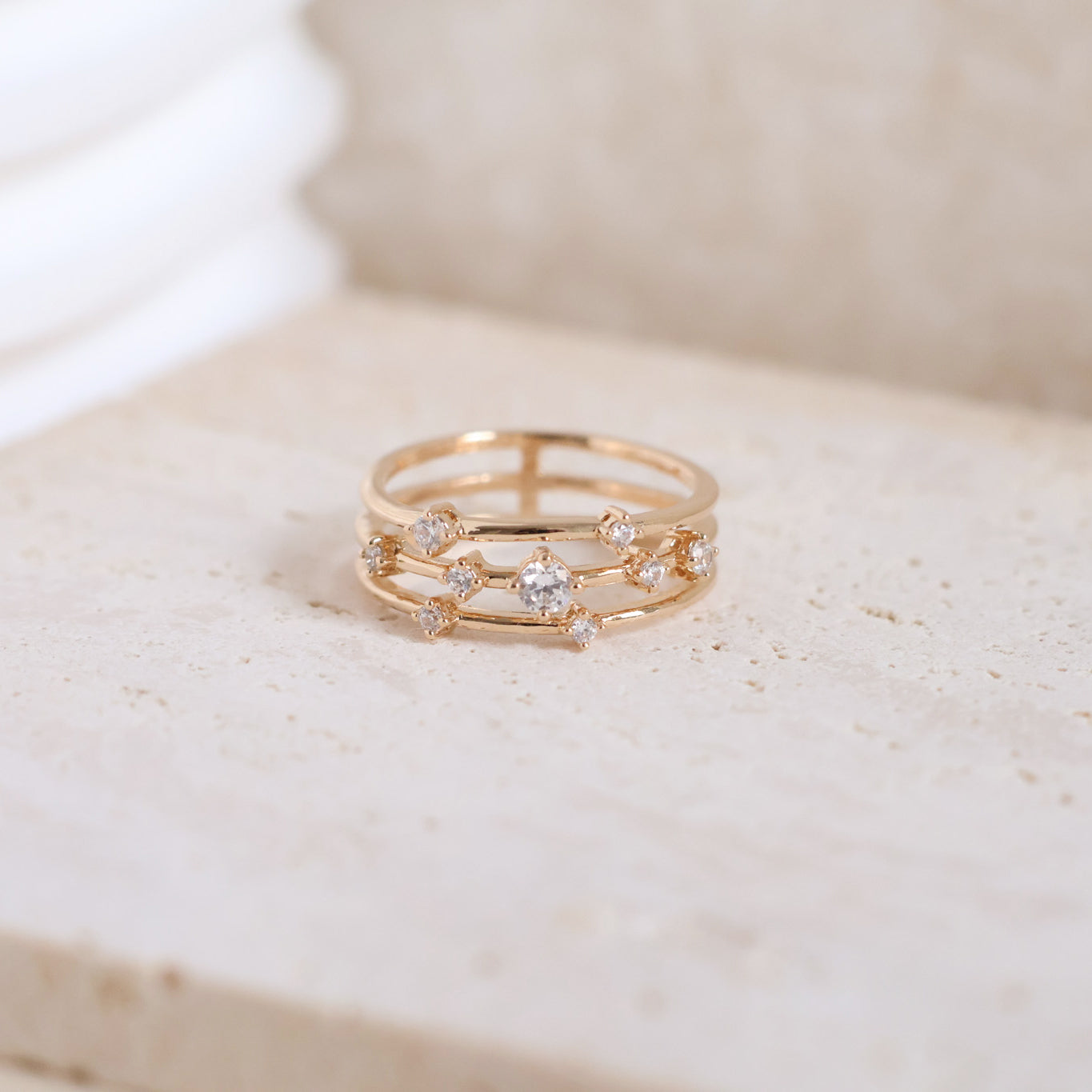 Sadao three row ring with zircons gold plated