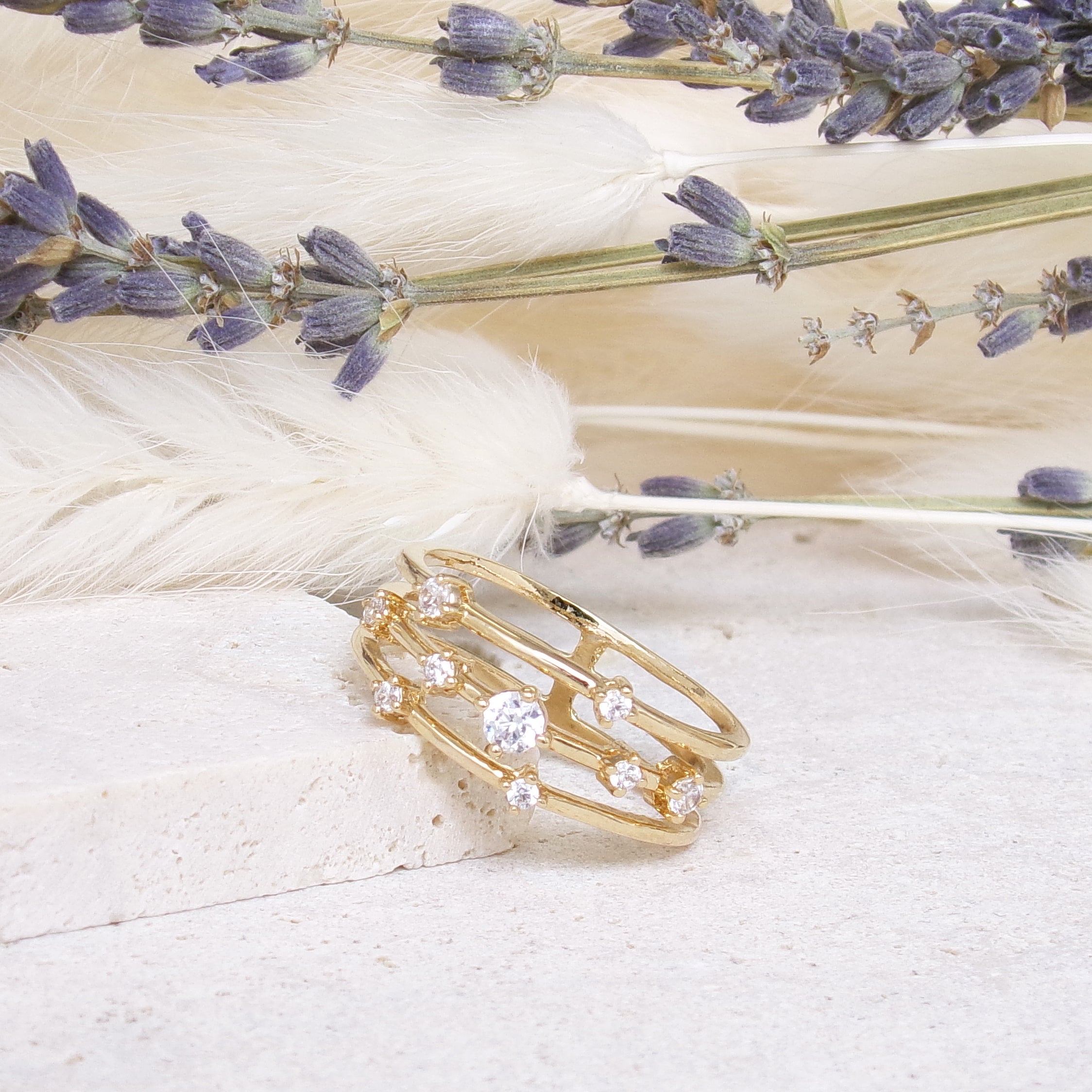 Sadao three row ring with zircons gold plated