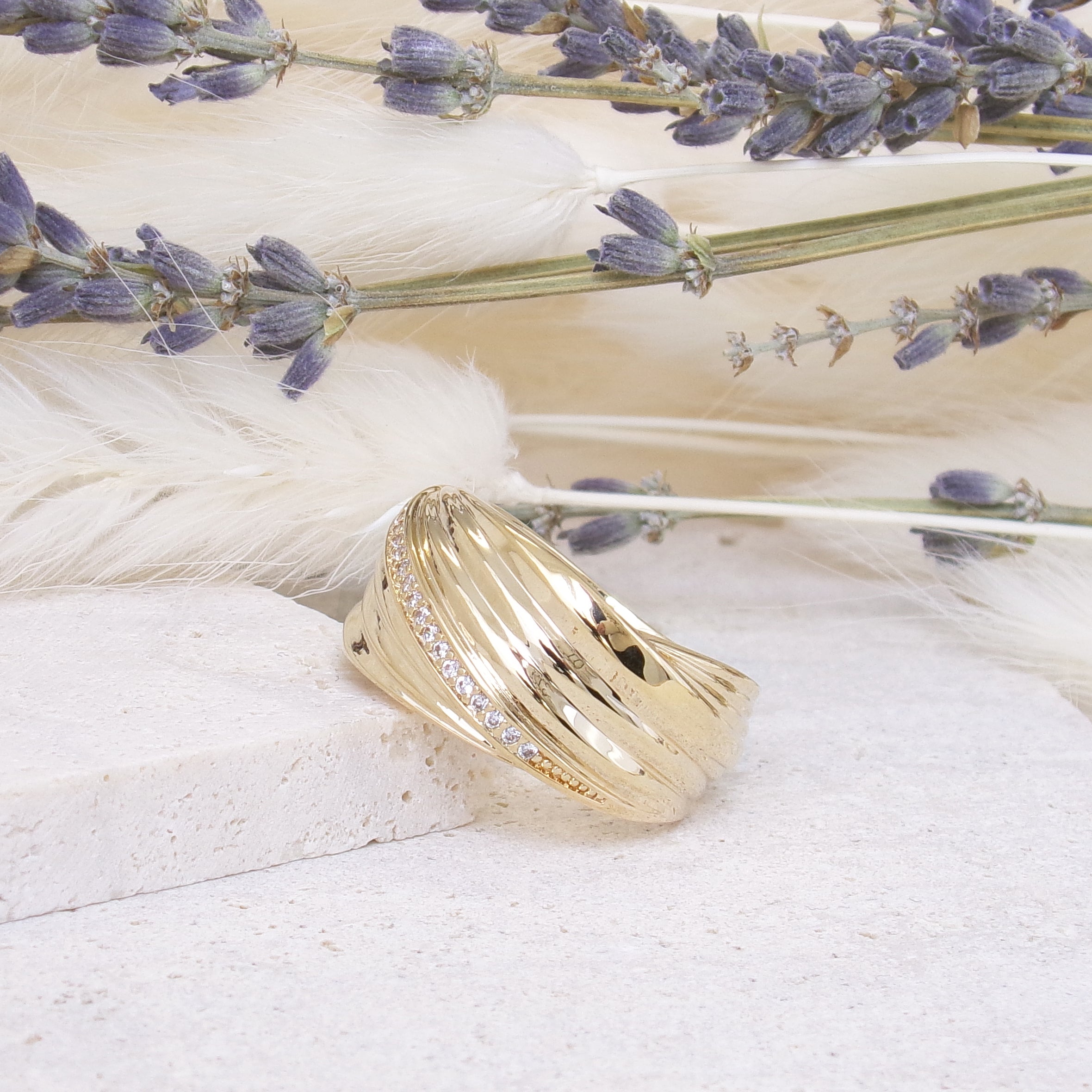 Cali ring asymmetrical draped with zircons gold plated