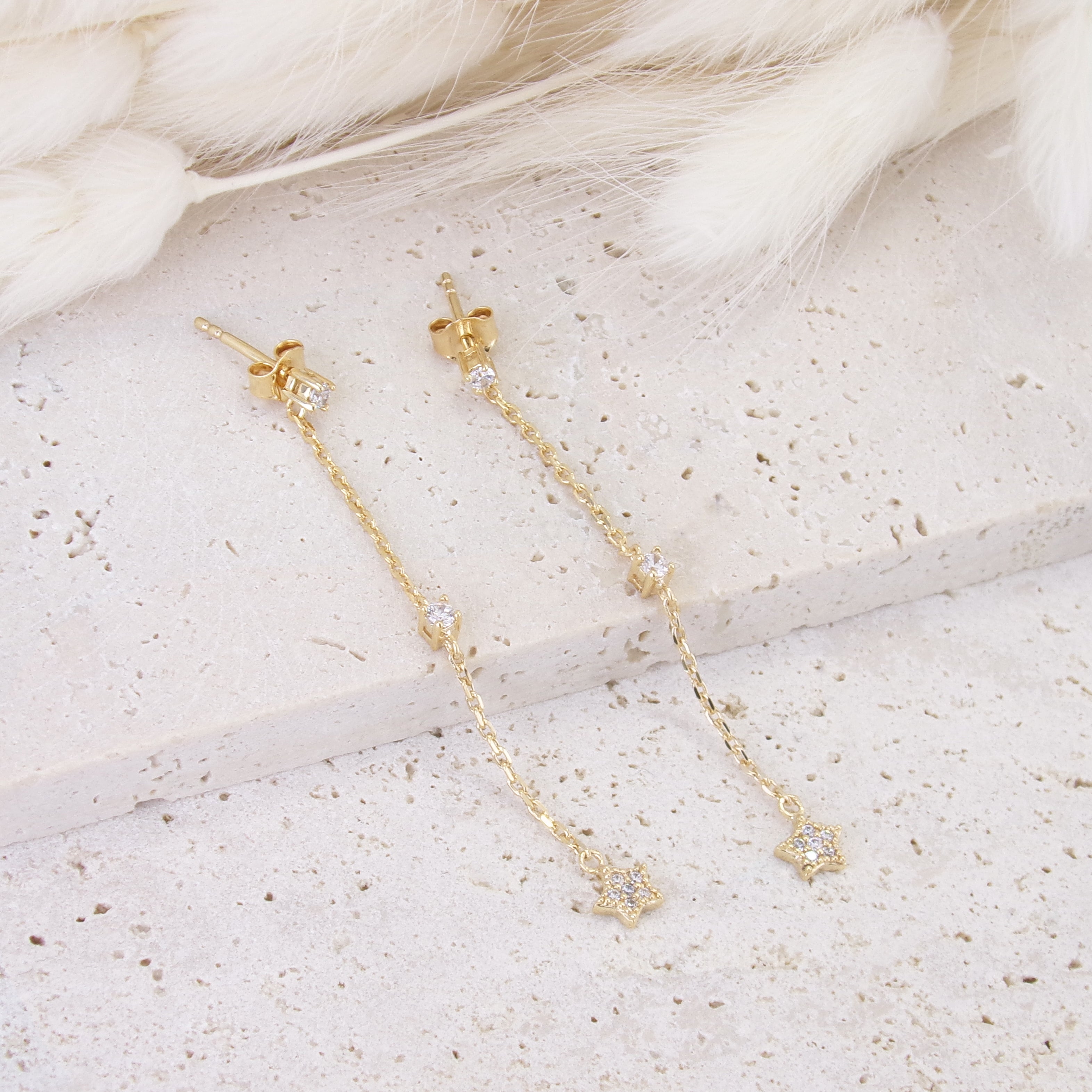 Mia earrings with chains of zircons and stars gold-plated