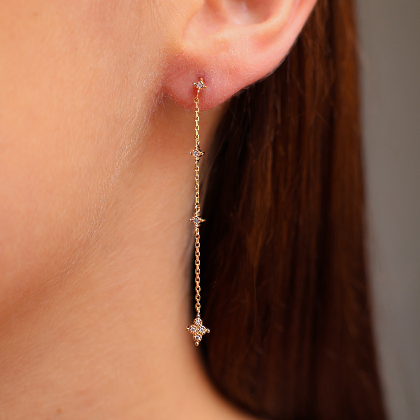 Java earrings with chains stars and zircons gold-plated