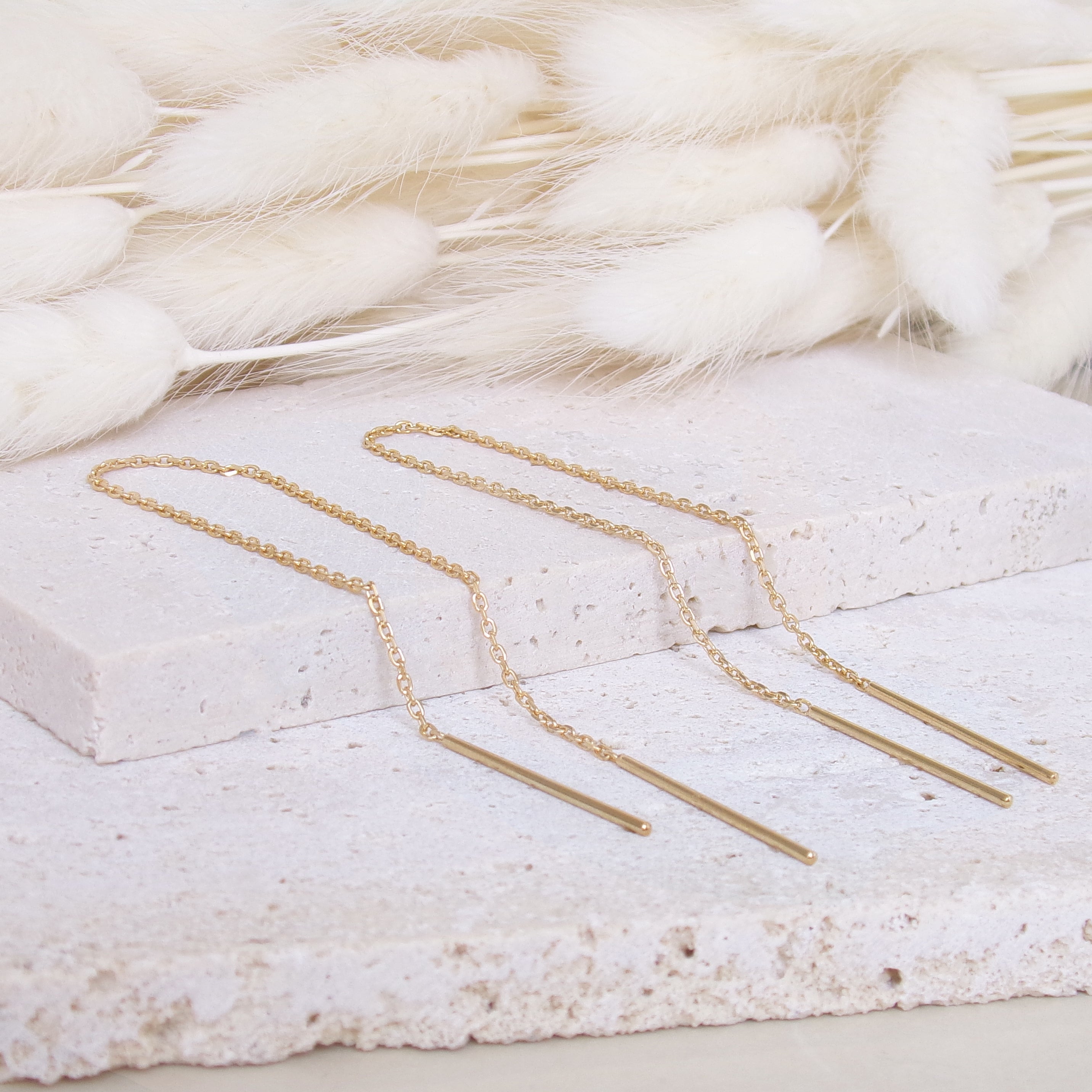 Gold-plated through-chain dangling Raya earrings