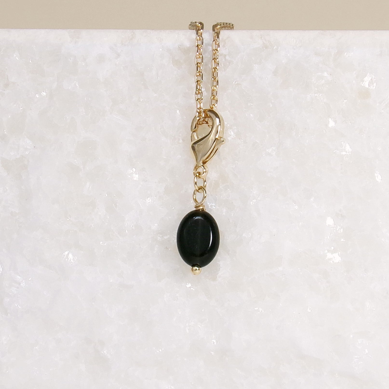 Black Obsidian charm gold-plated