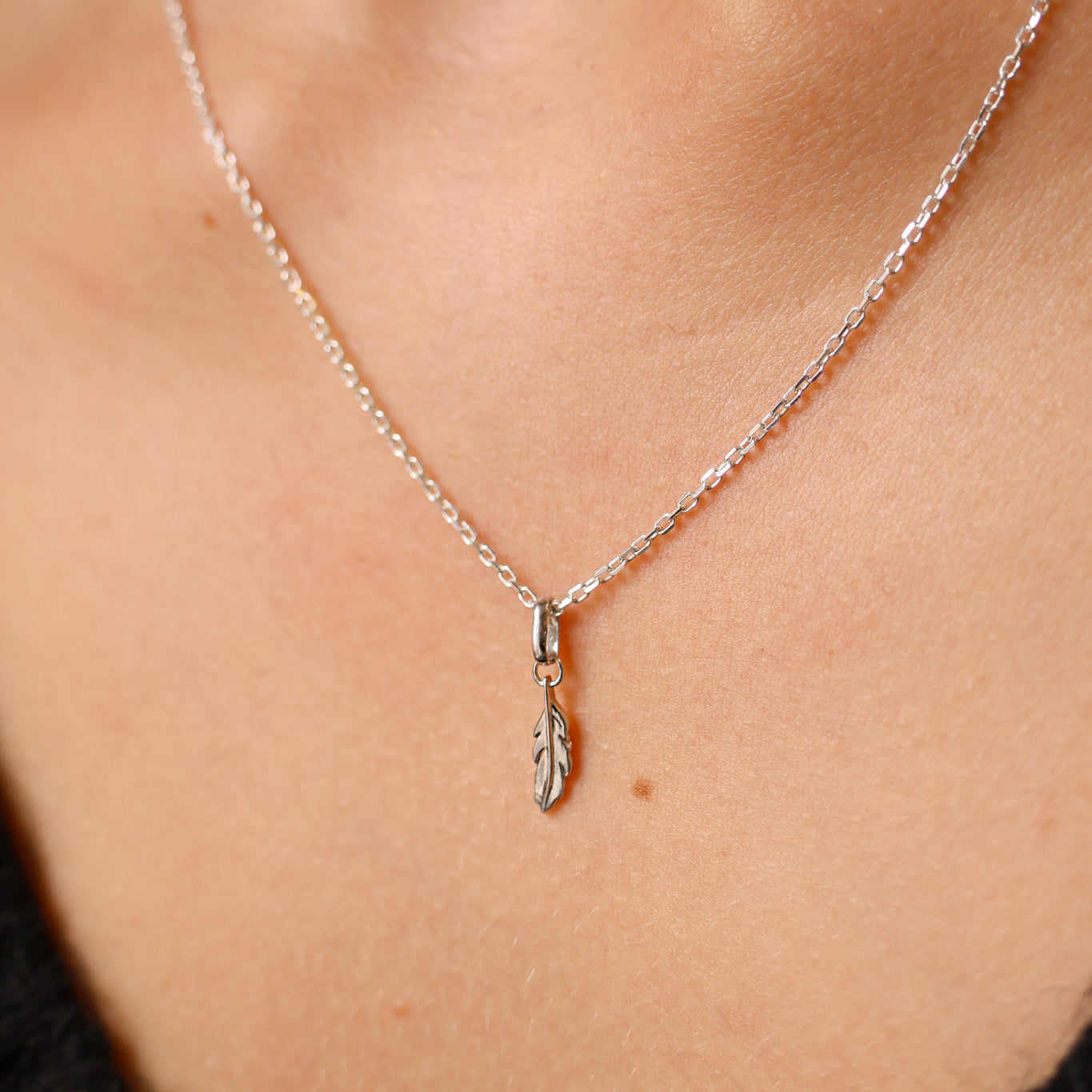 Feather charm 10mm sterling silver