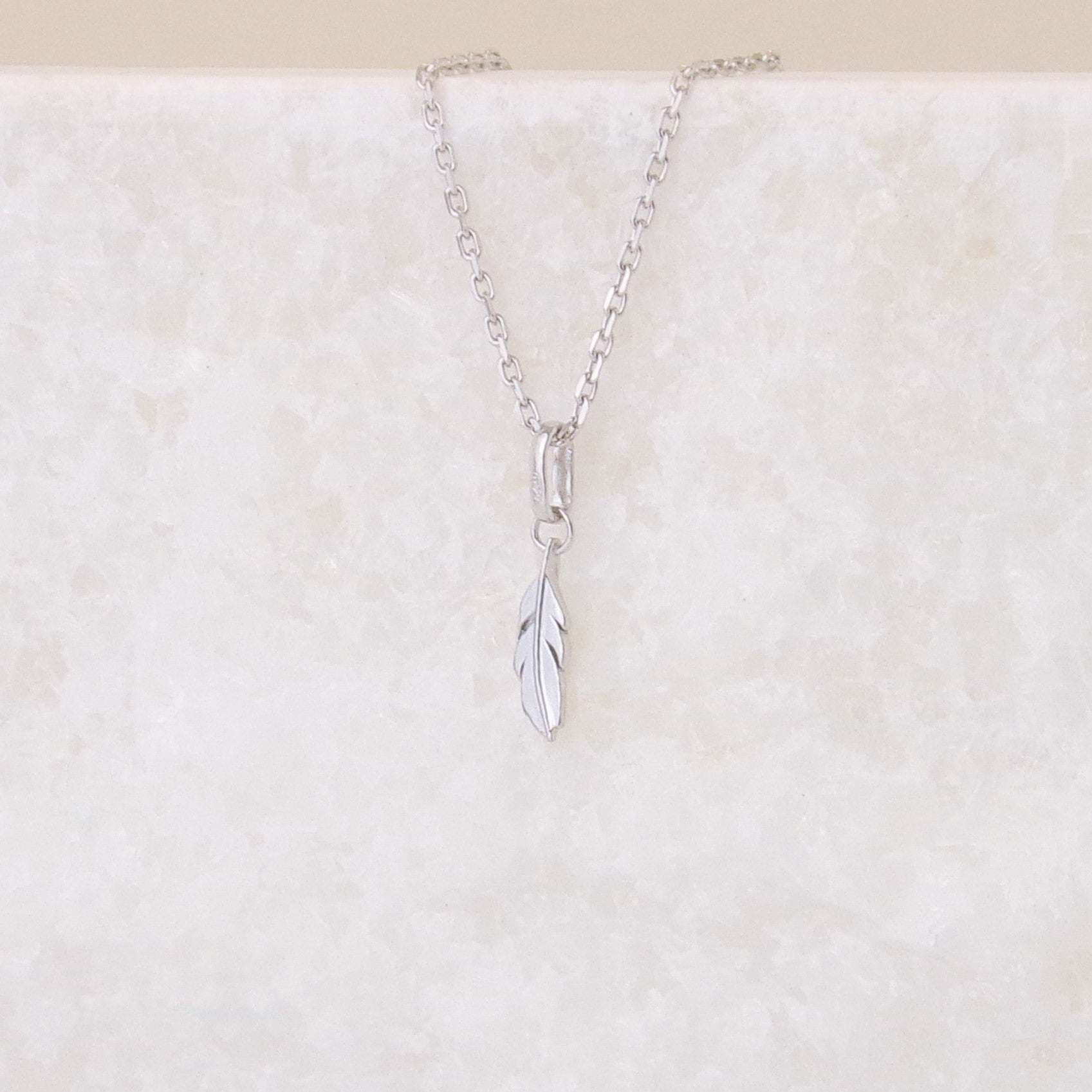 Feather charm 10mm sterling silver
