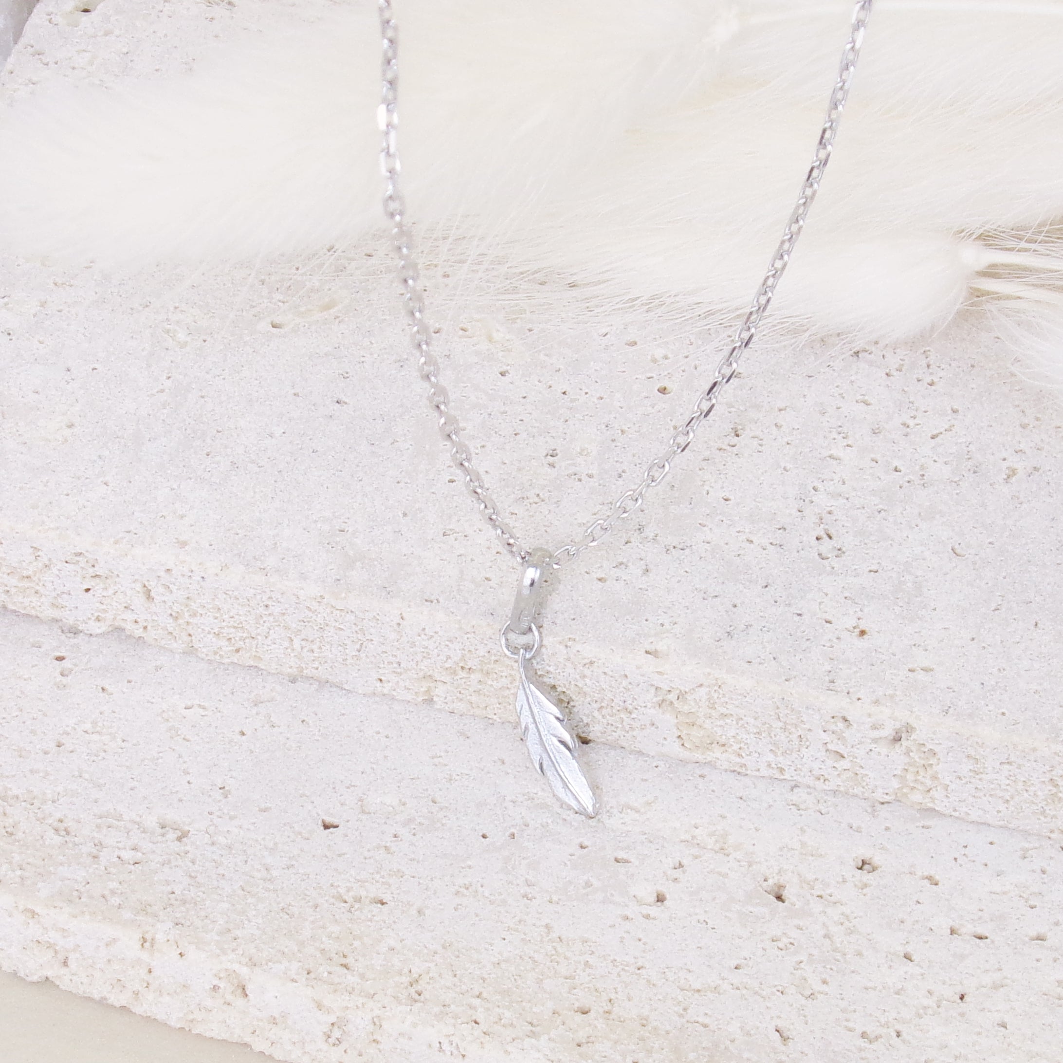 Feather charm 10mm sterling silver