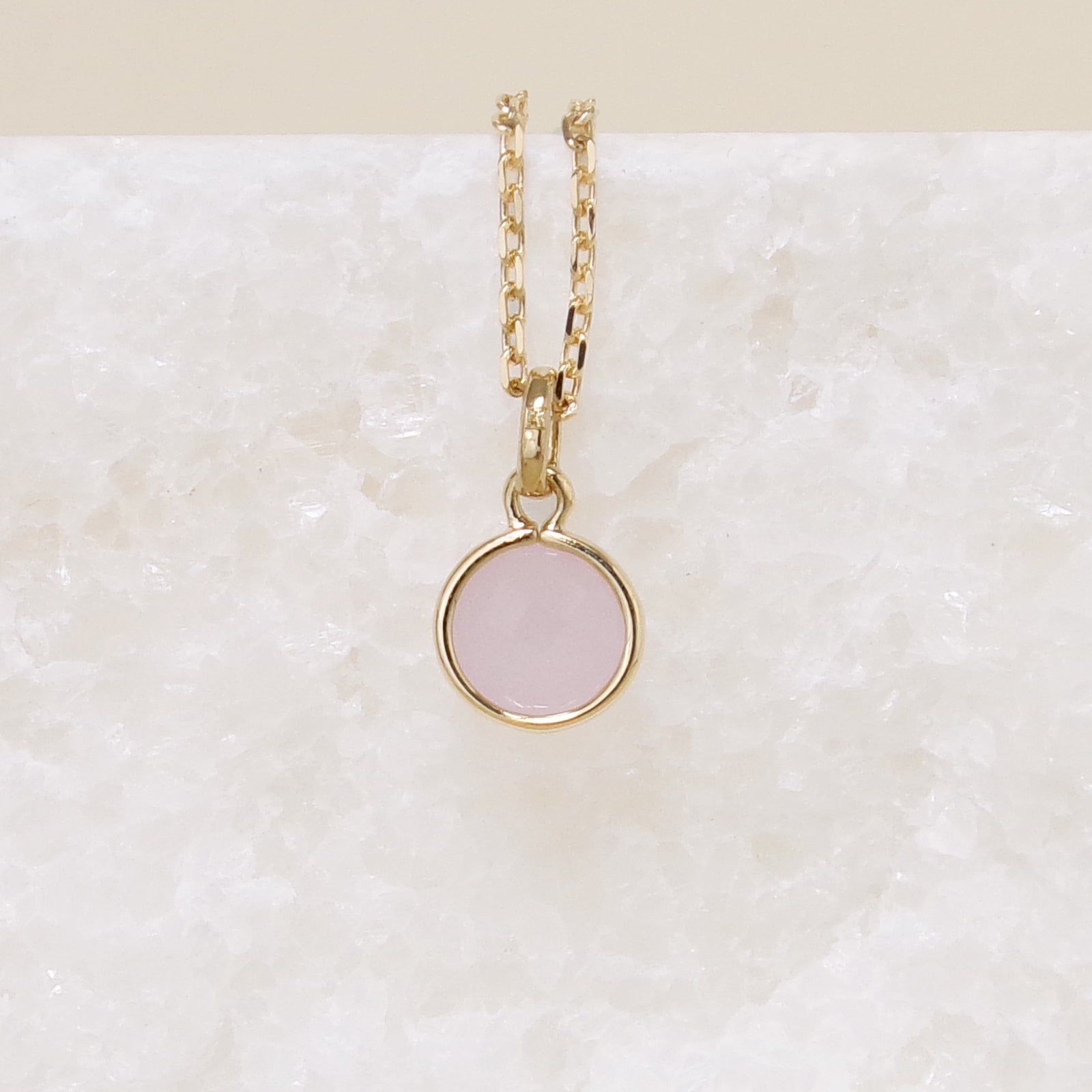 Solana charm pastel pink stone gold-plated