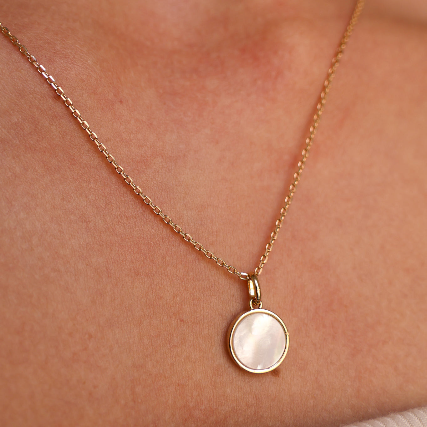 Mother-of-pearl charm gold-plated