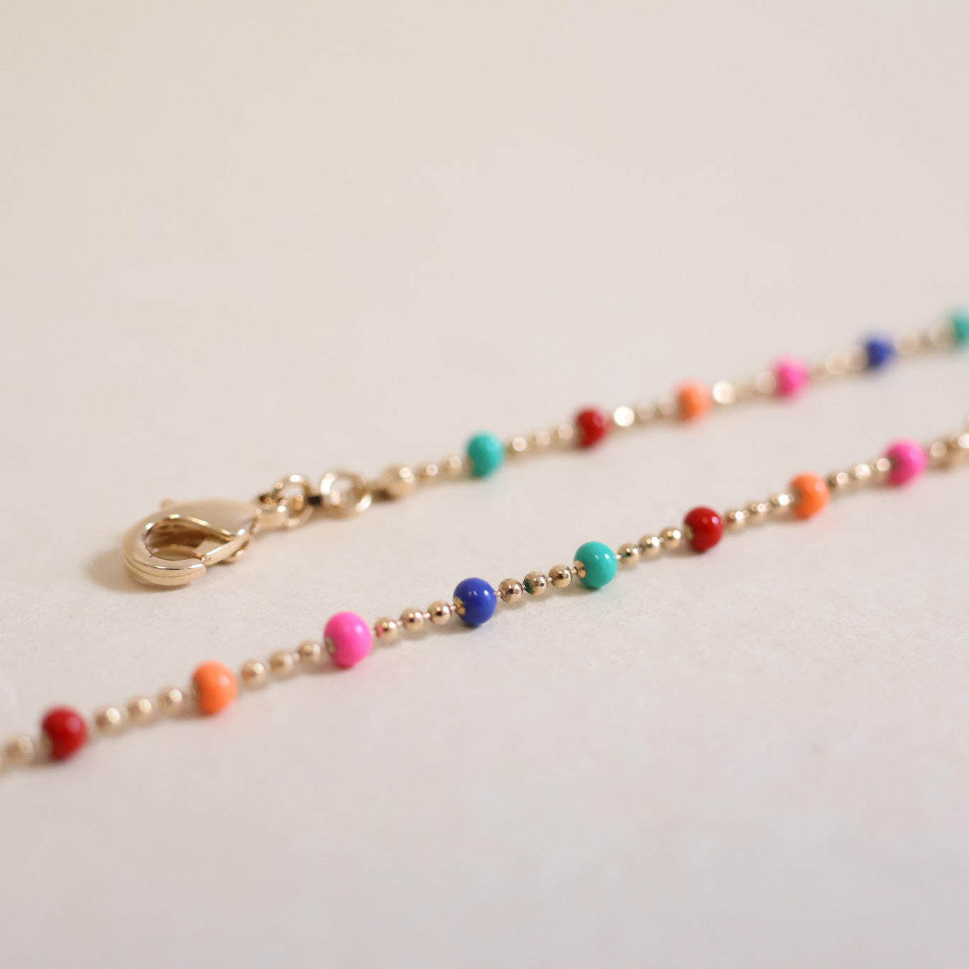 Almaria chain multicoloured lacquered beads gold-plated