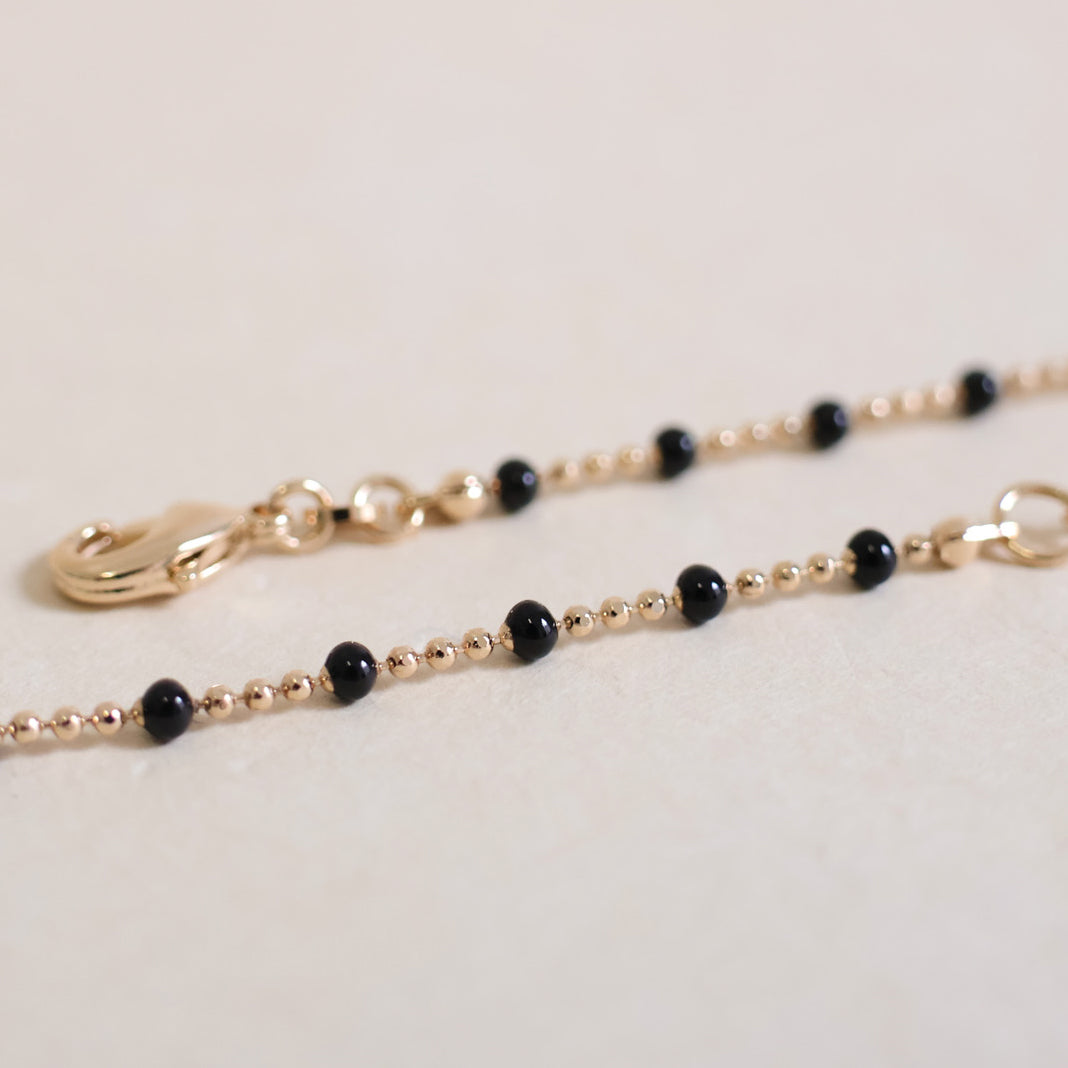 Black enamel beaded Almaria necklace with gold-plated mesh