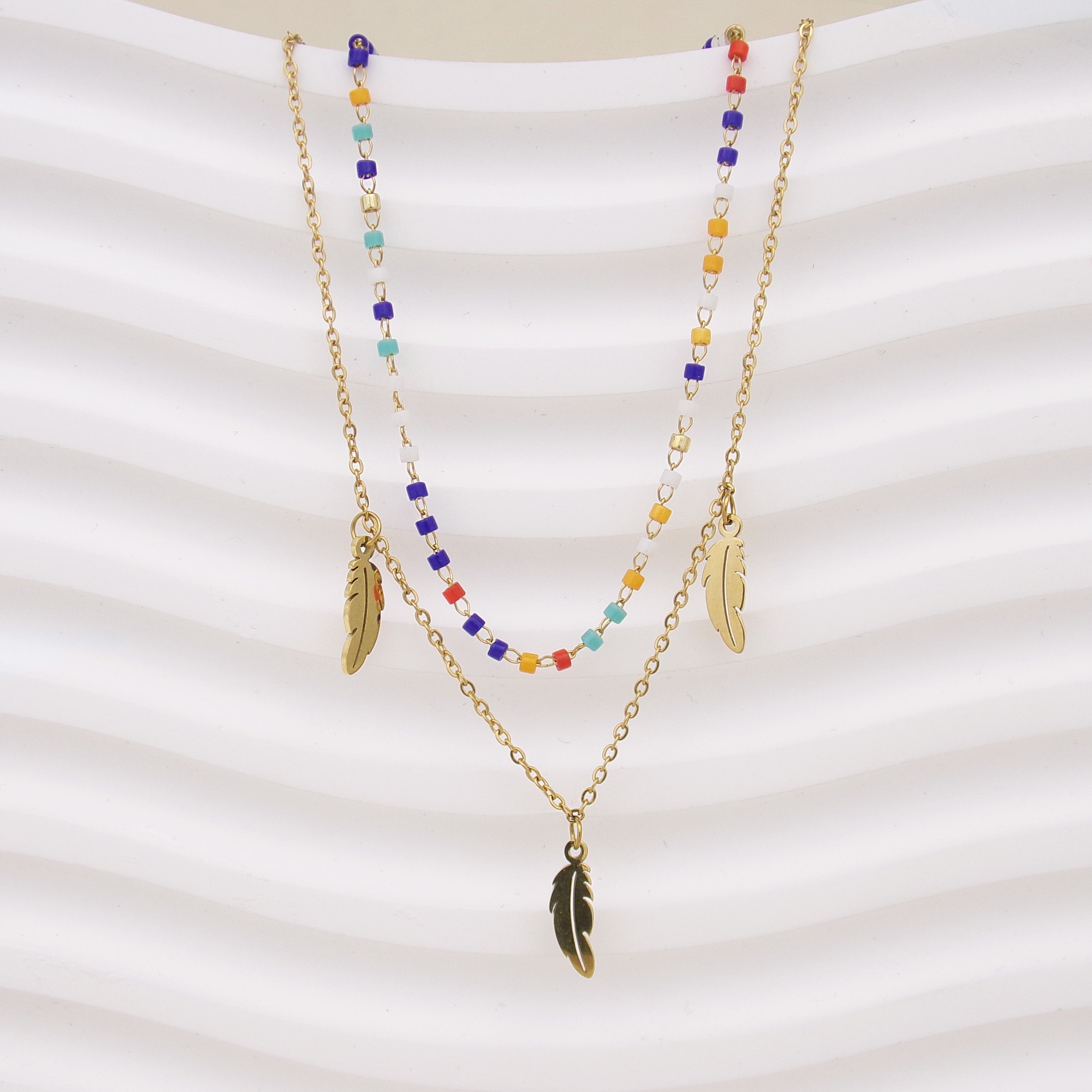 Double row Sara necklace with multicolored beads and stainless steel feather tassels