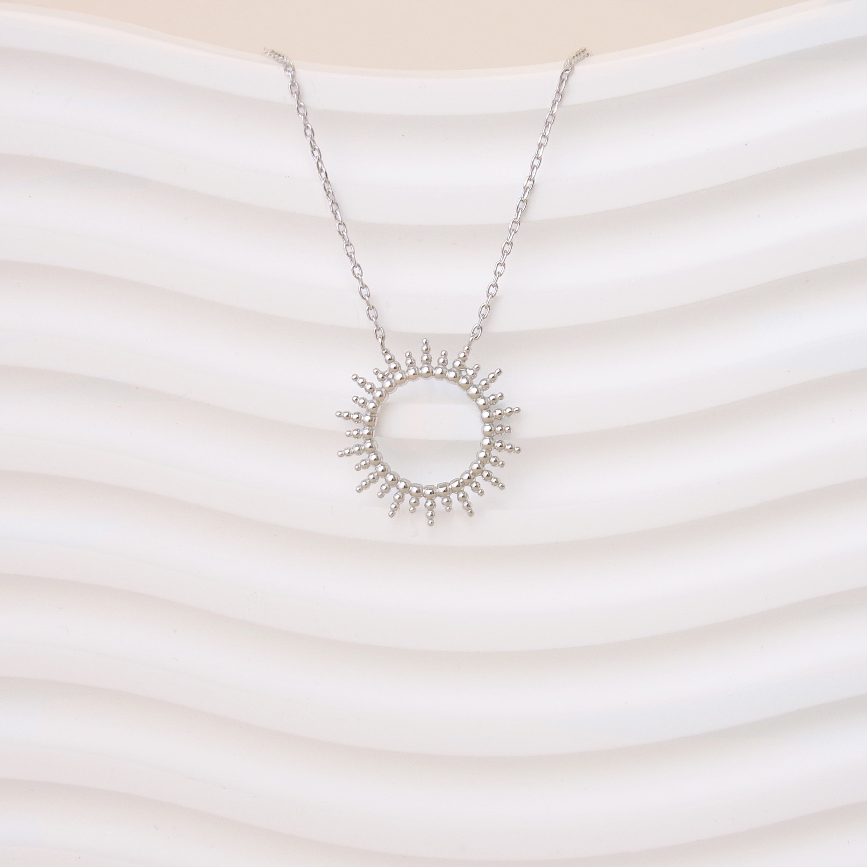 Bright silver sun Moanda necklace