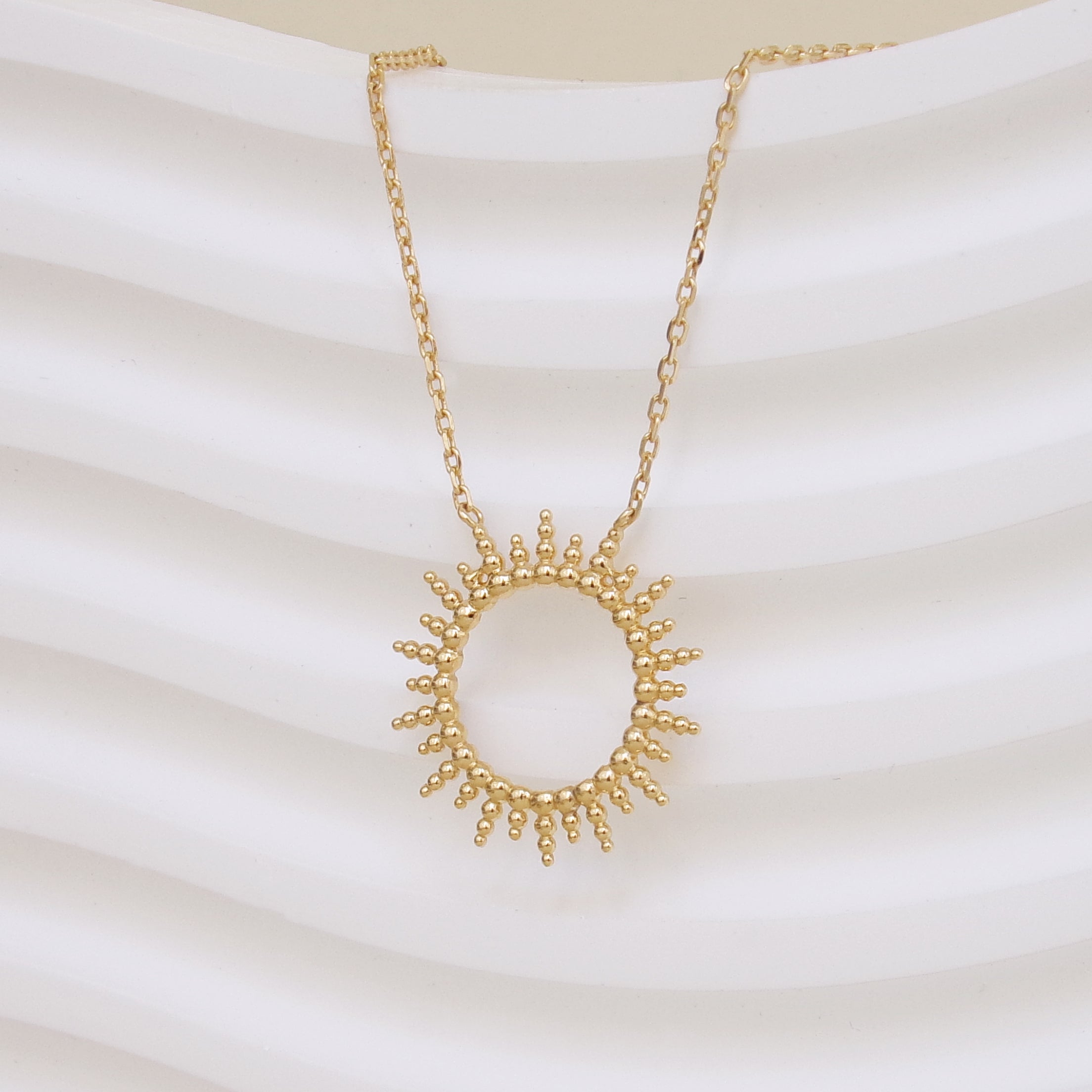 Gold-plated glowing sun Moanda necklace