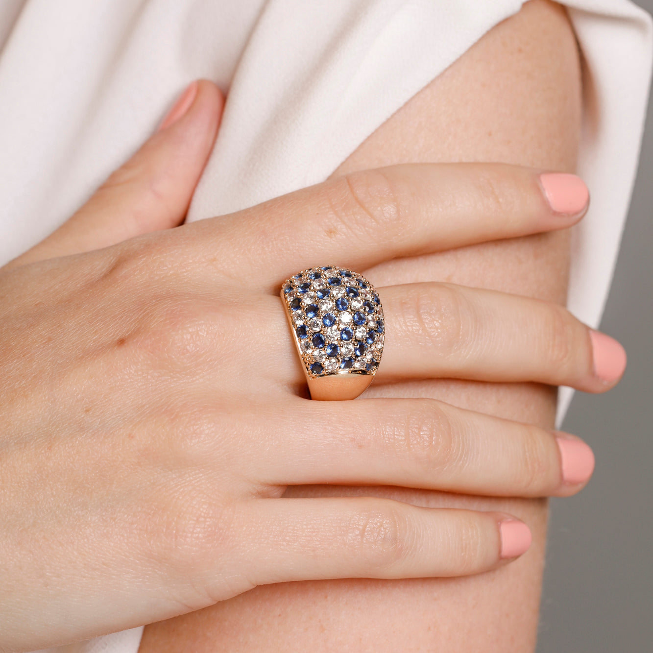 Nolita curved ring with white and blue zircons gold-plated