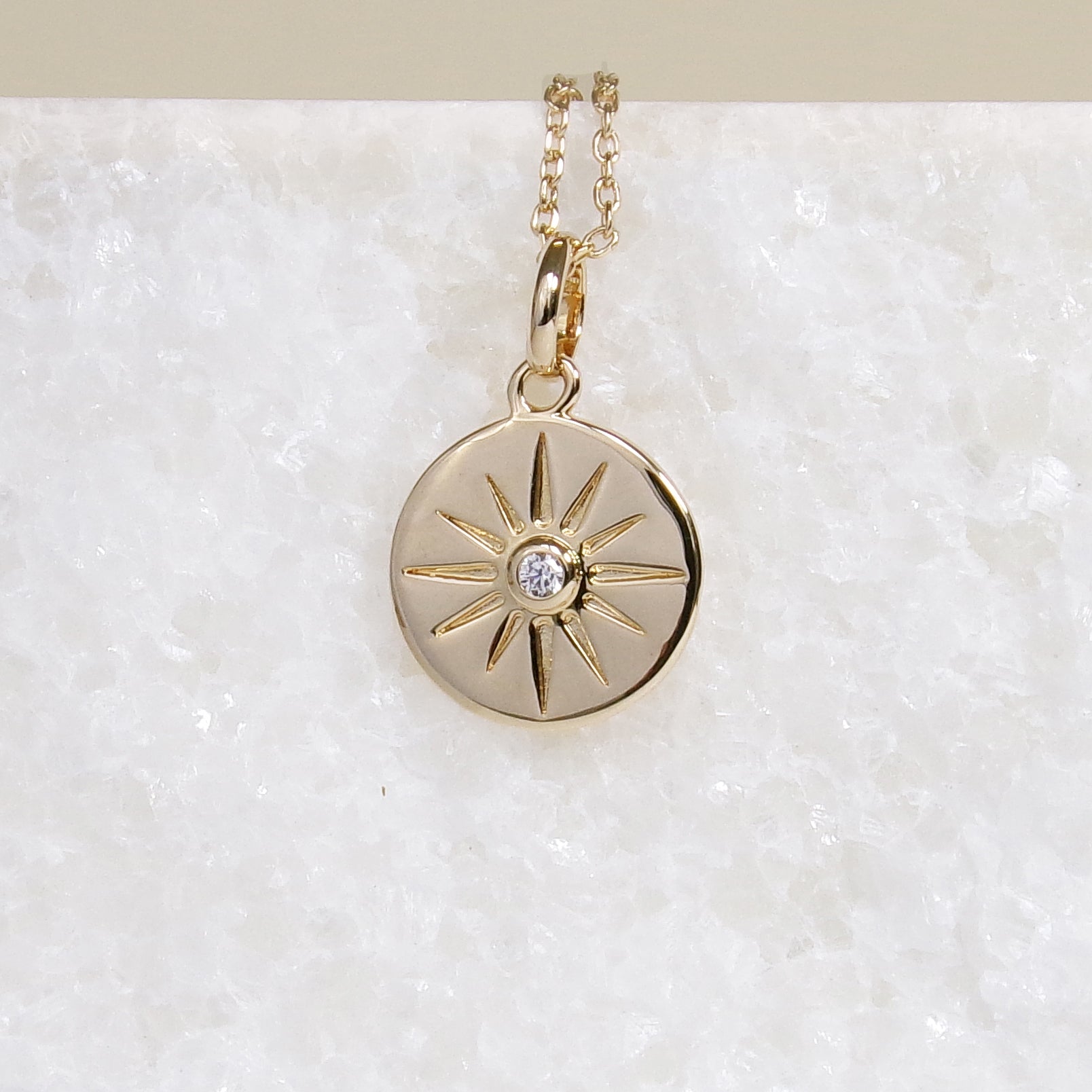 Sparkling Sun charm gold-plated