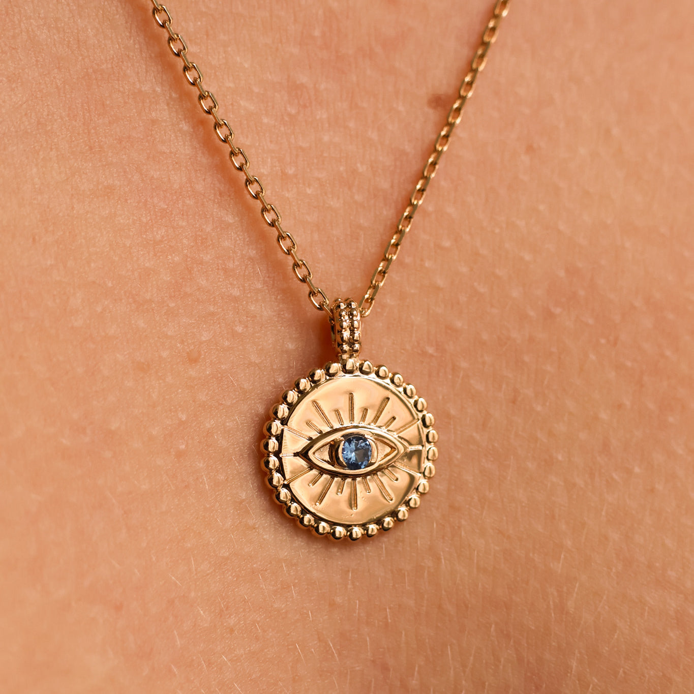 Gold-plated blue oxide protective eye medal pendant to engrave