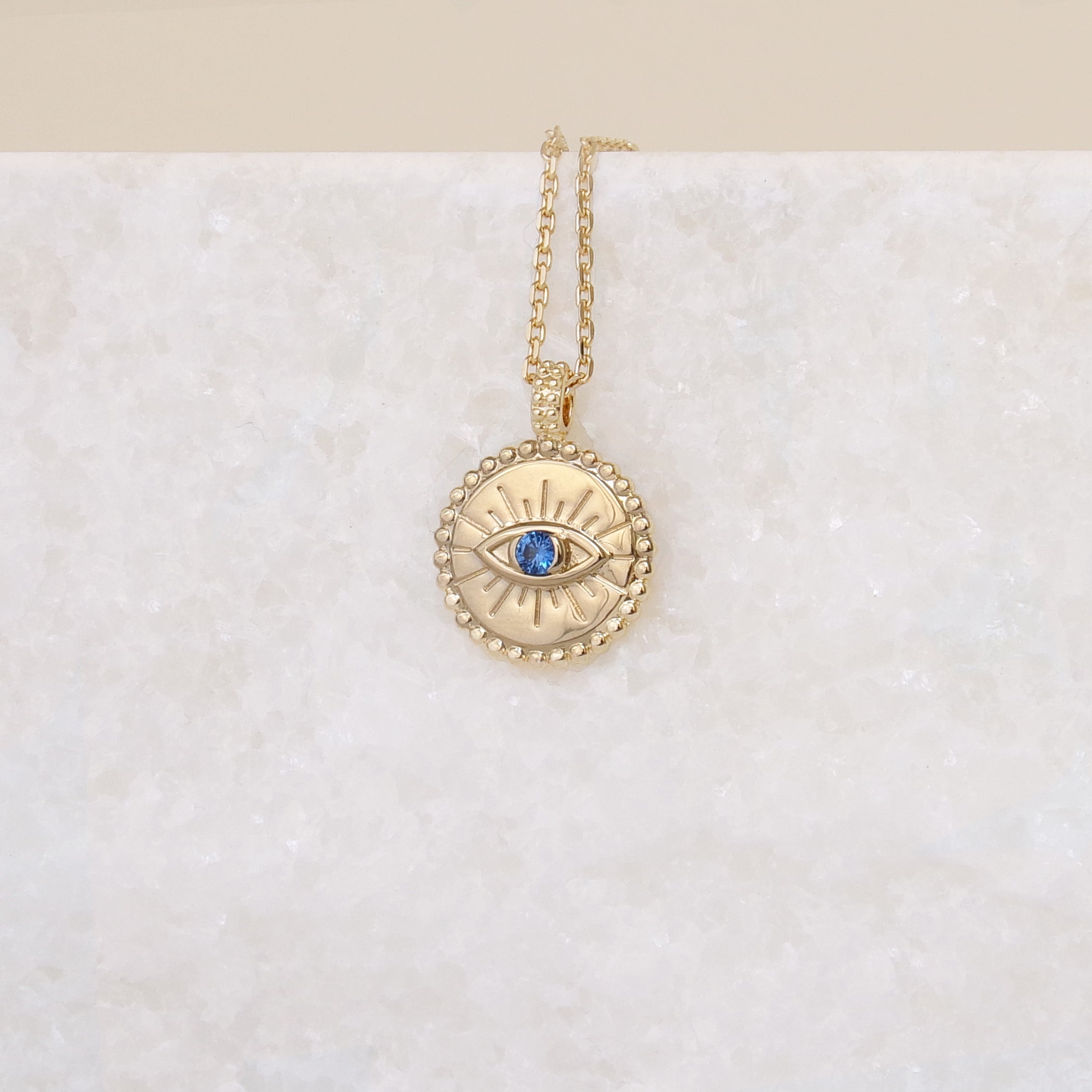 Gold-plated blue oxide protective eye medal pendant to engrave