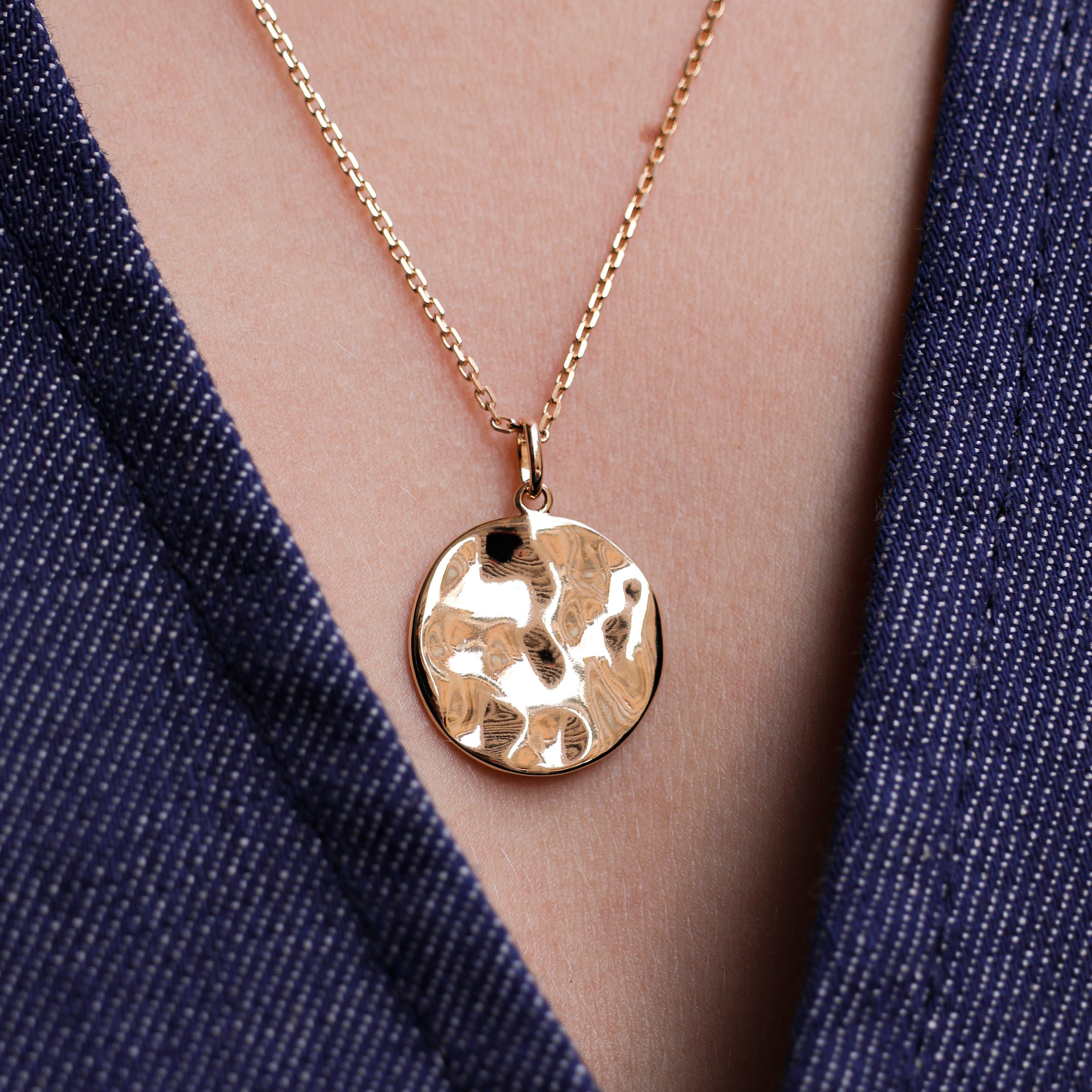 Gold-plated hammered medal pendant