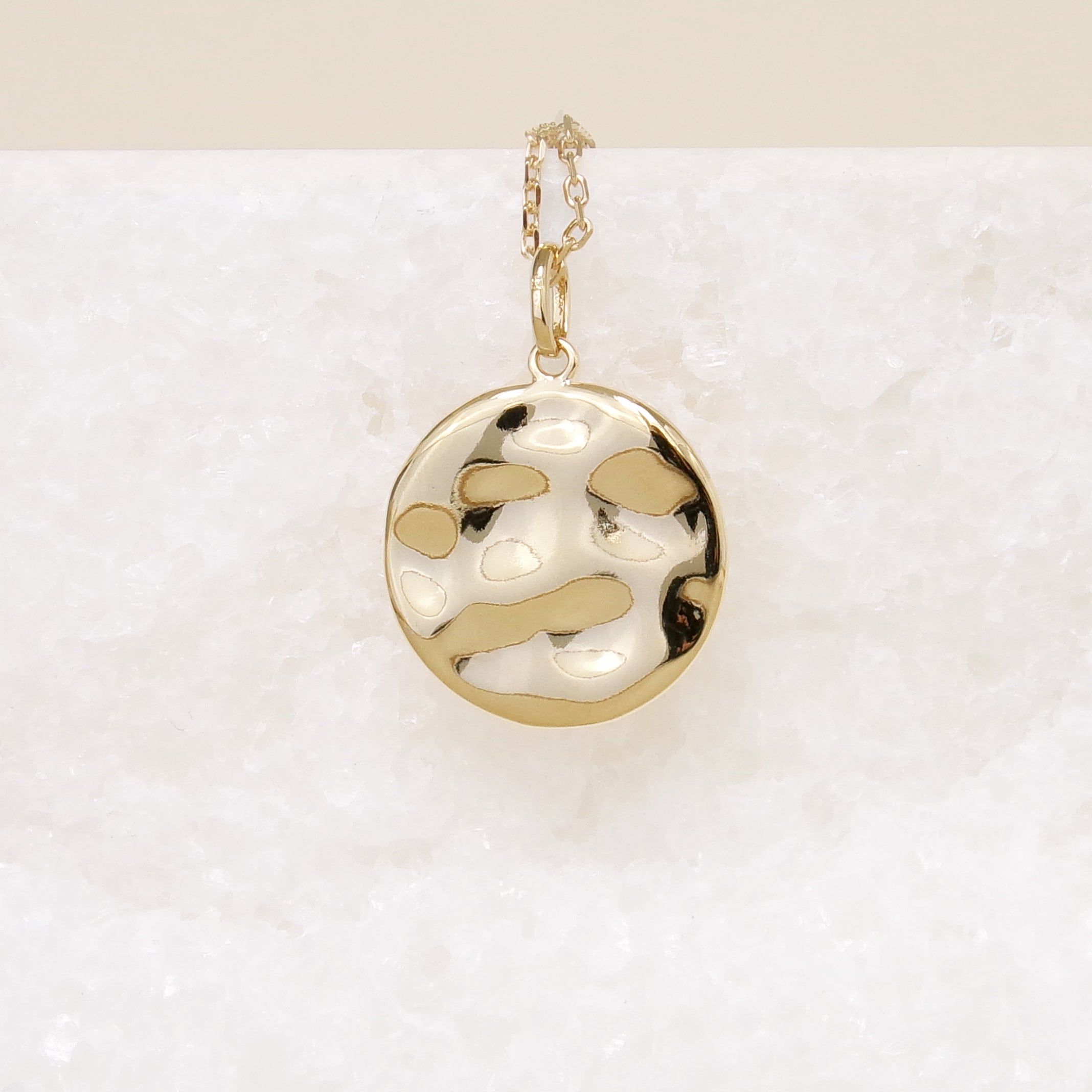 Gold-plated hammered medal pendant