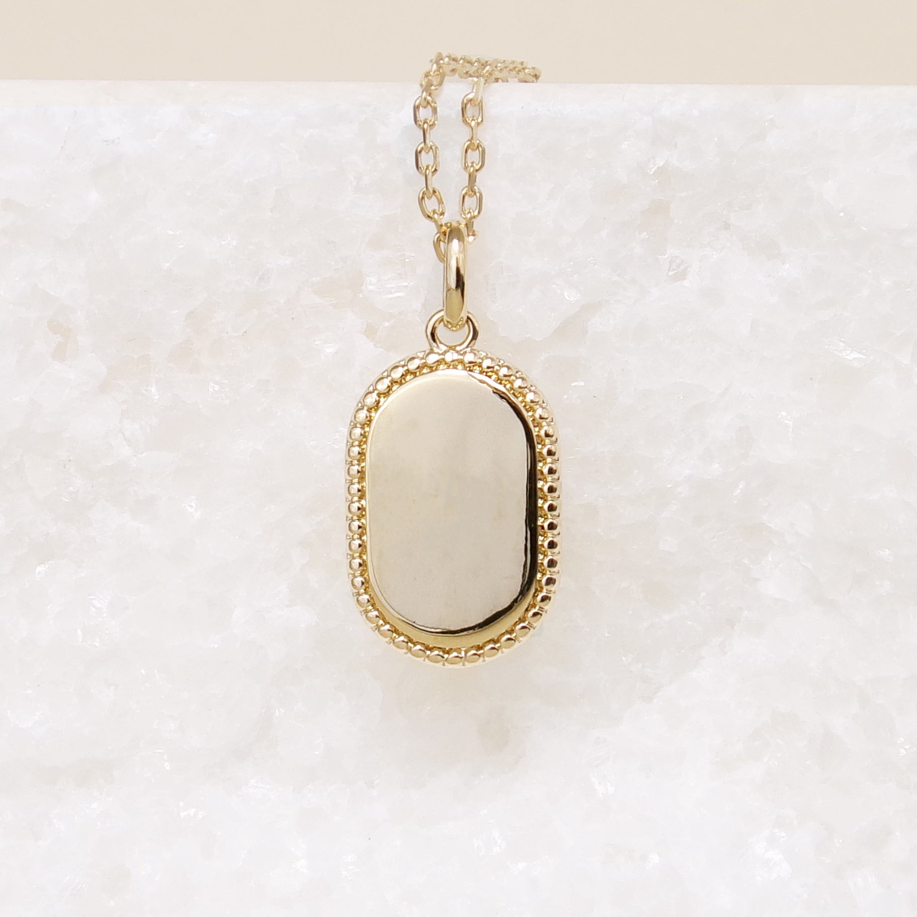 Gold-plated oval medal pendant to engrave