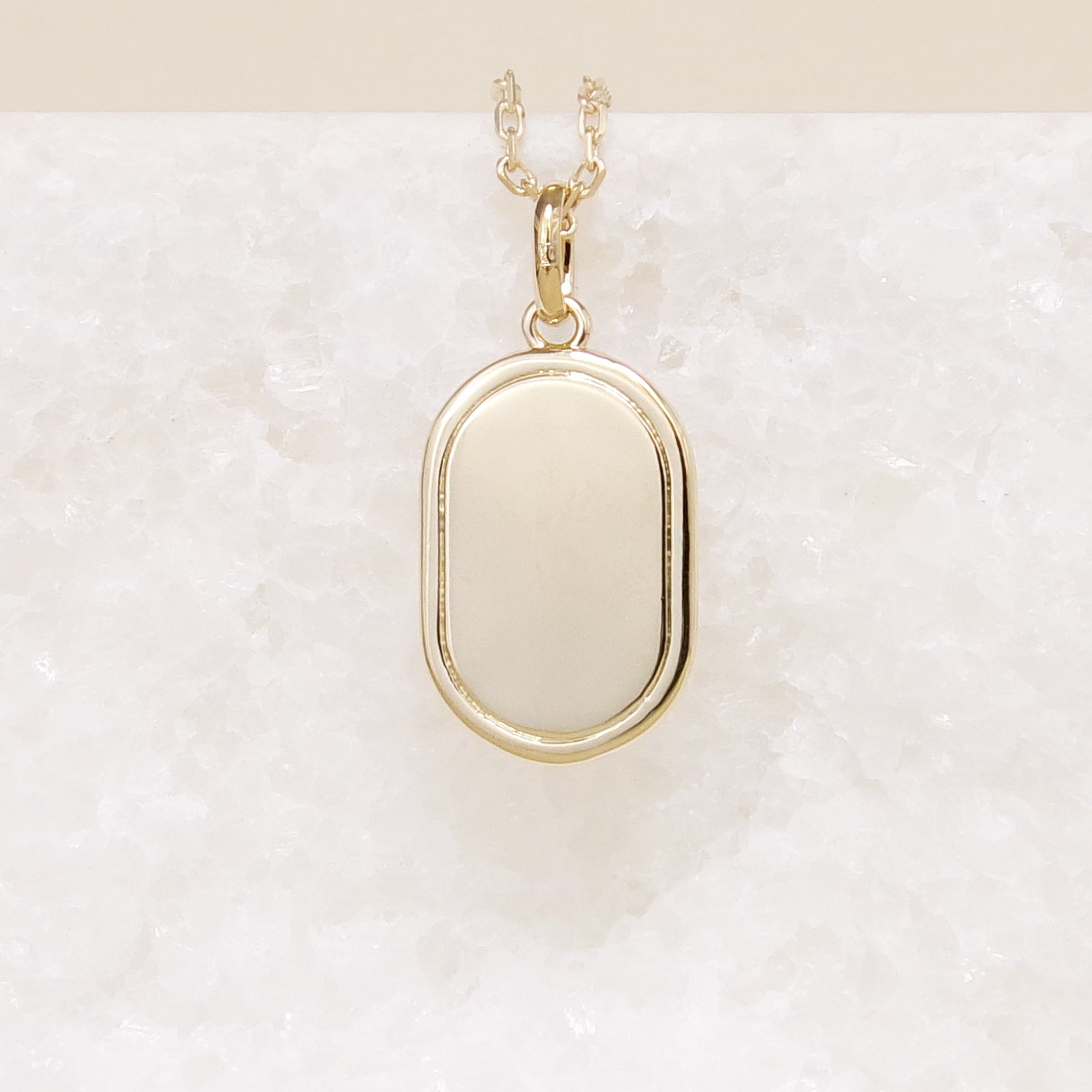 Gold-plated oval medal pendant to engrave