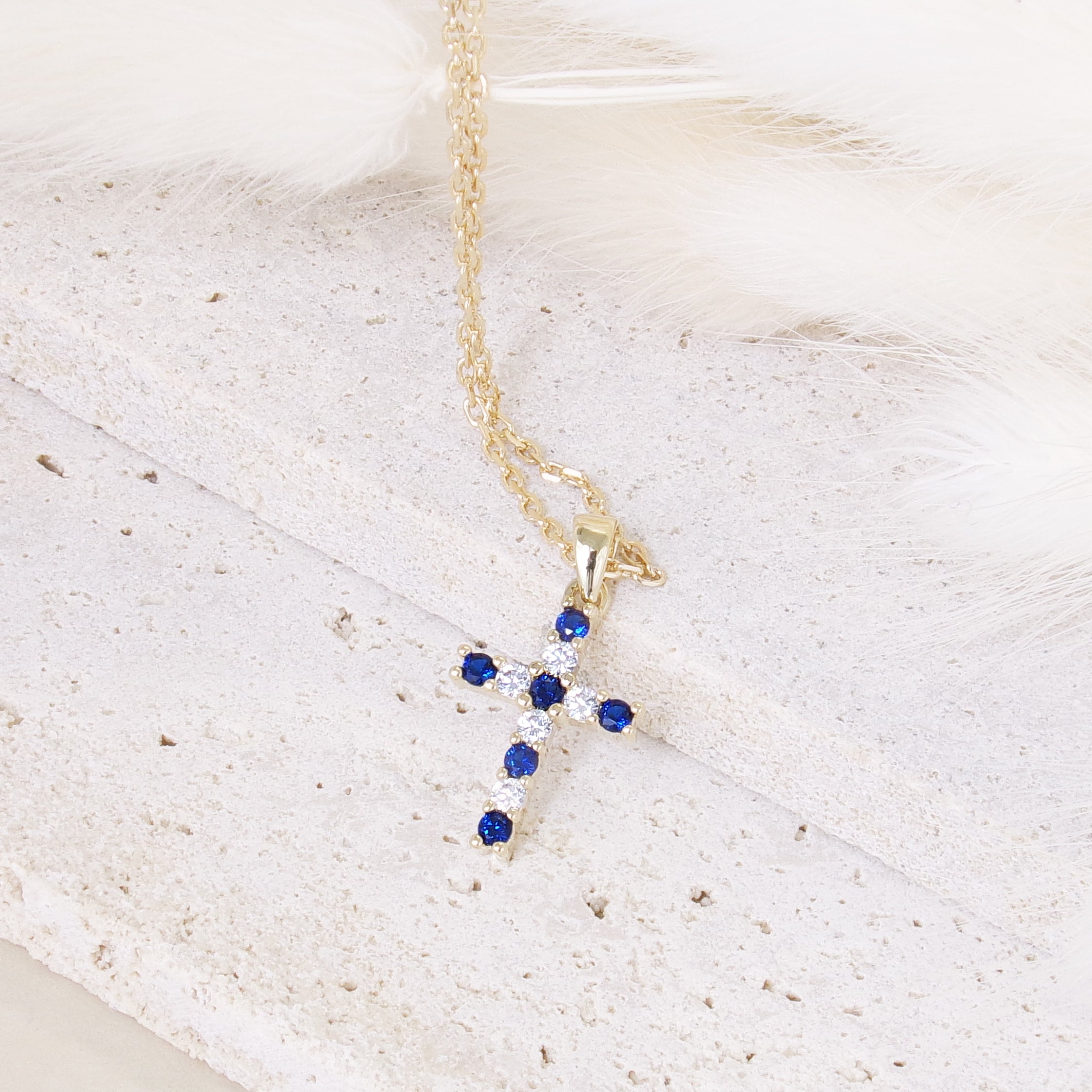 Gold-plated blue and white oxide cross pendant