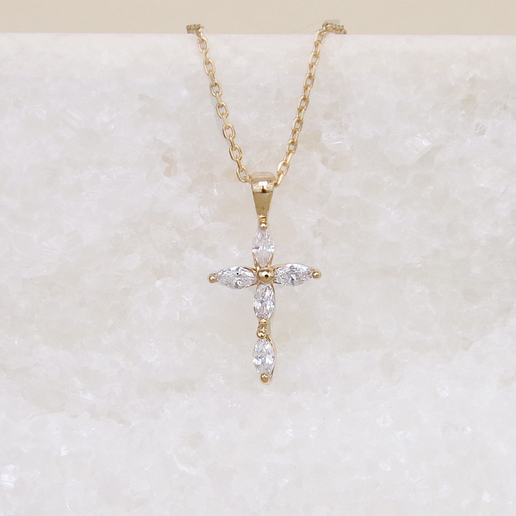 Religious cross pendant with oval oxides and gold plated