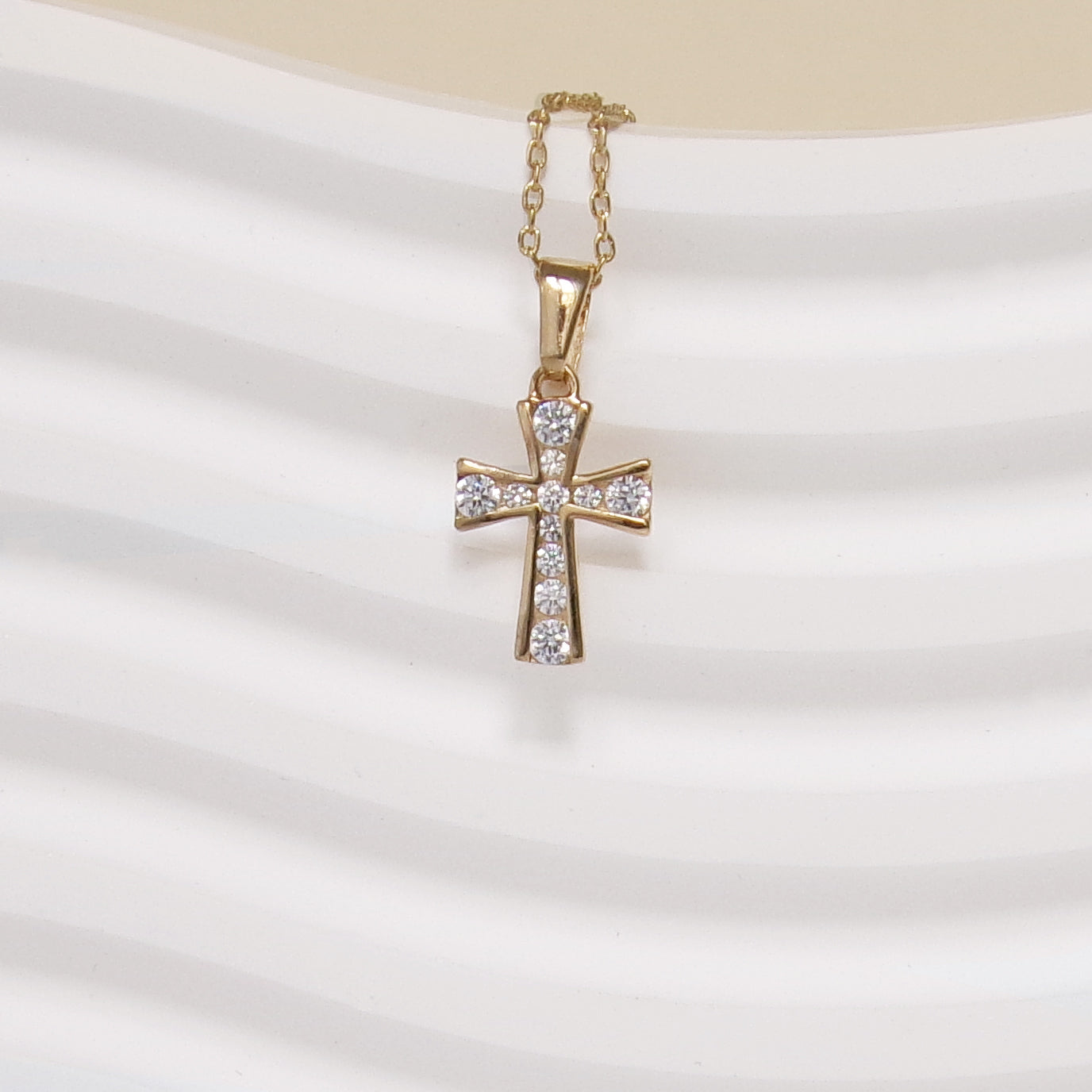Zirconium oxide and gold plated cross pendant