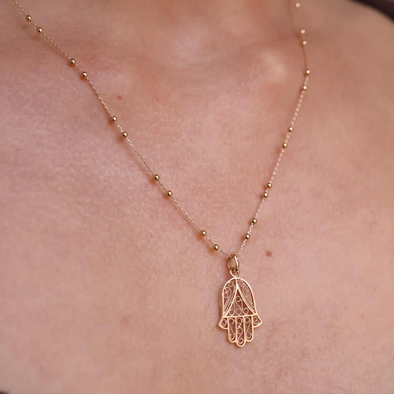 Gold-plated Hand of Fatima pendant