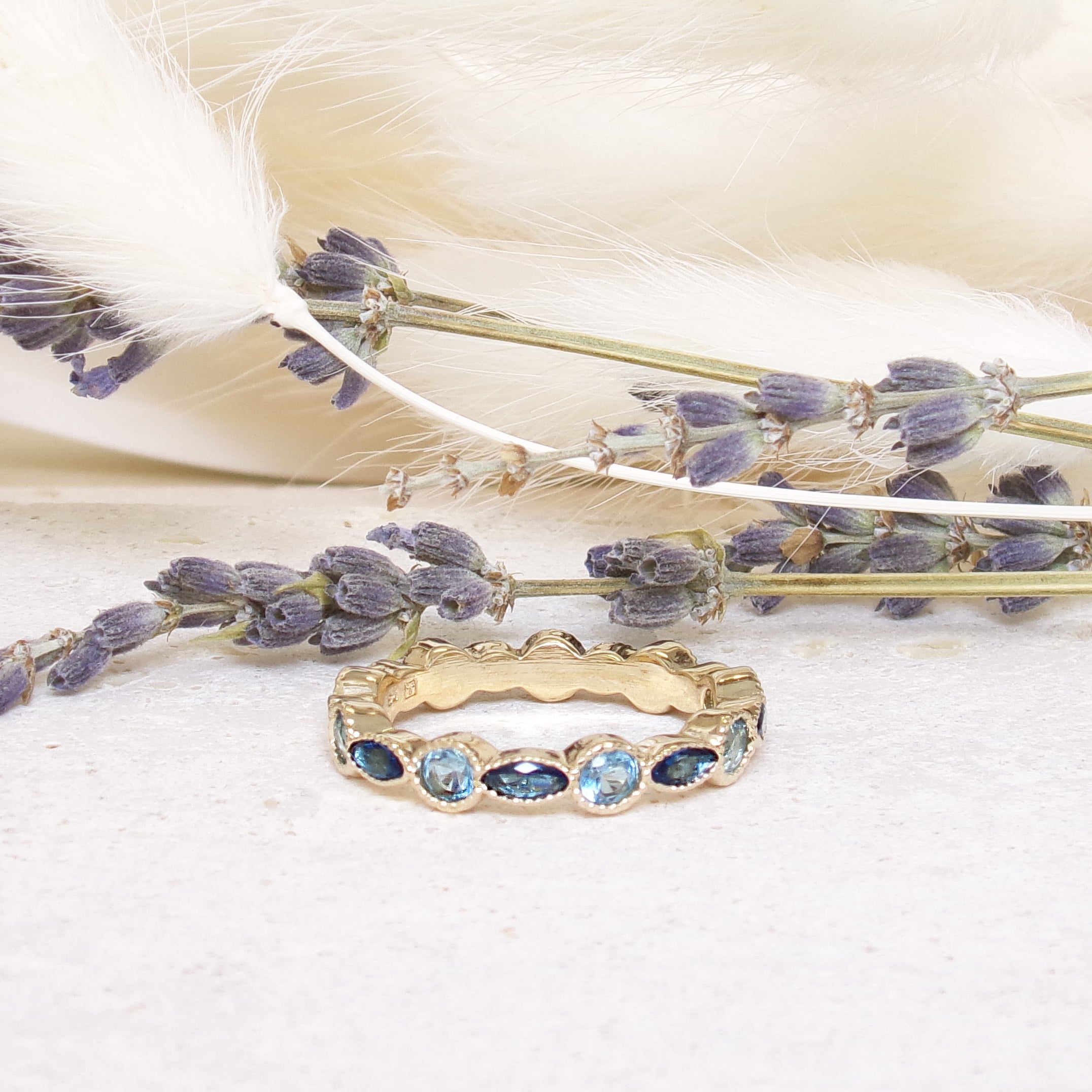 Nayasa feston band  ring with blue zircons gold plated