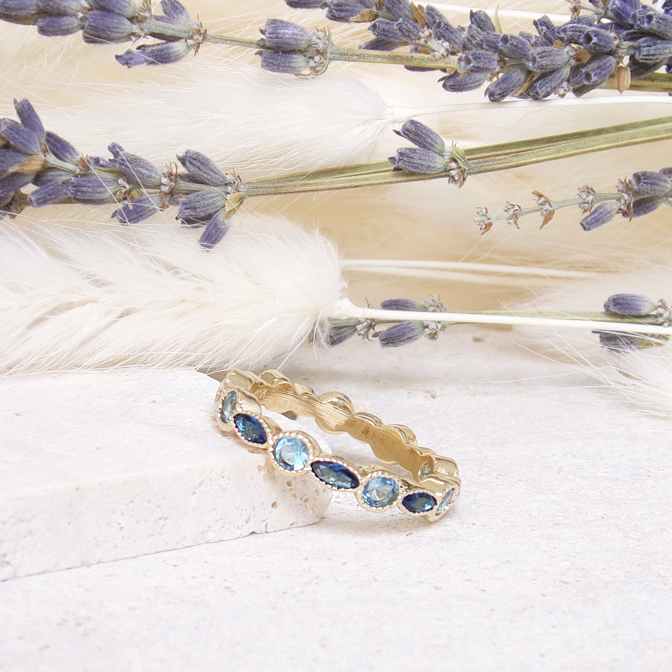 Nayasa feston band  ring with blue zircons gold plated