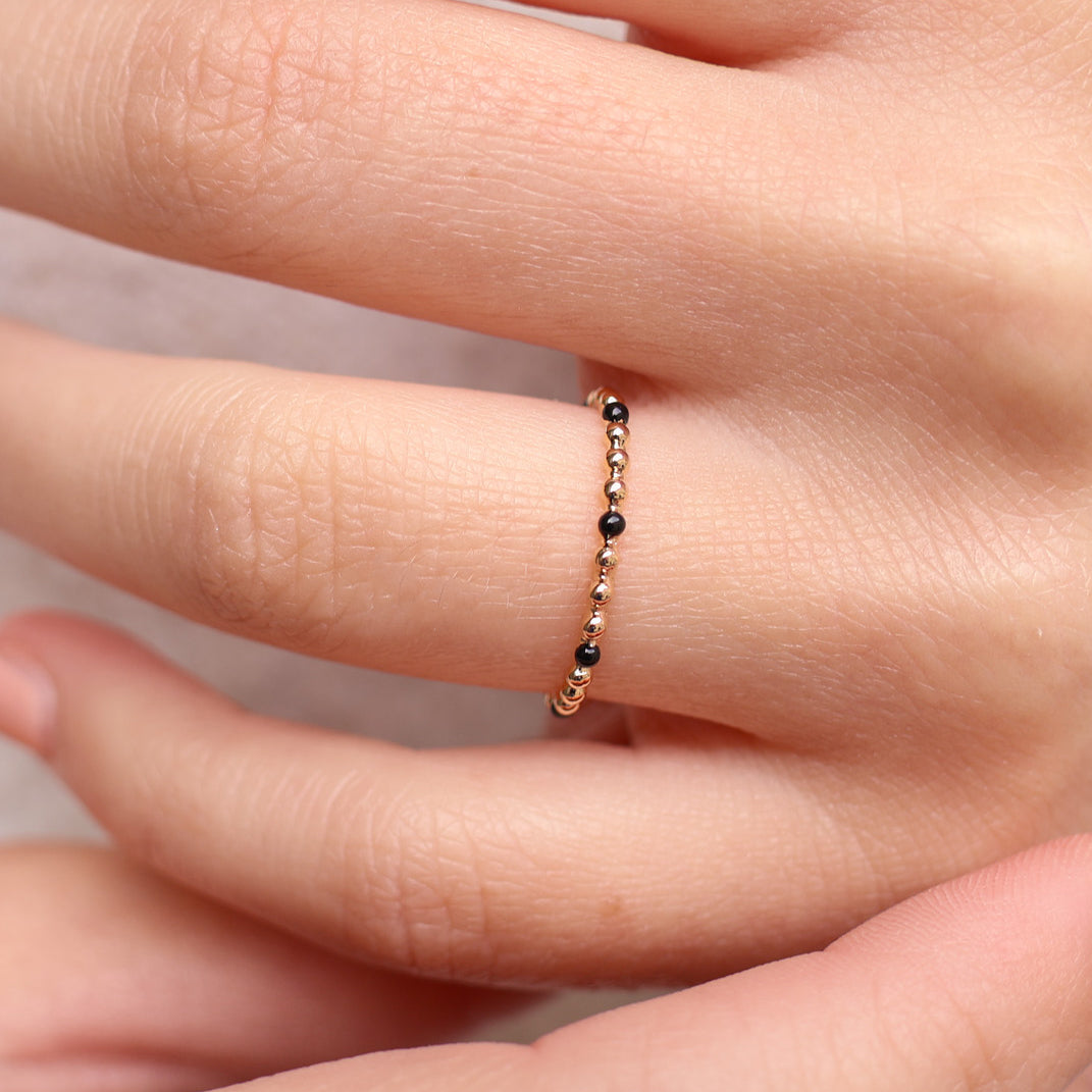 Dana beaded ring with black enamel gold-plated