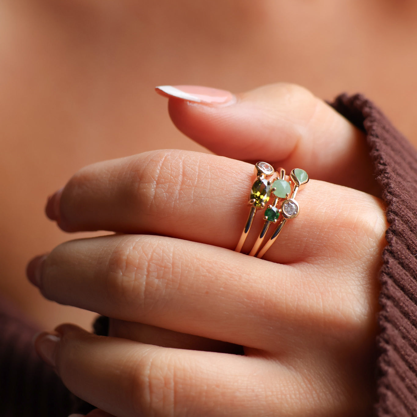 Anya ring three rows with white and green zircons gold plated