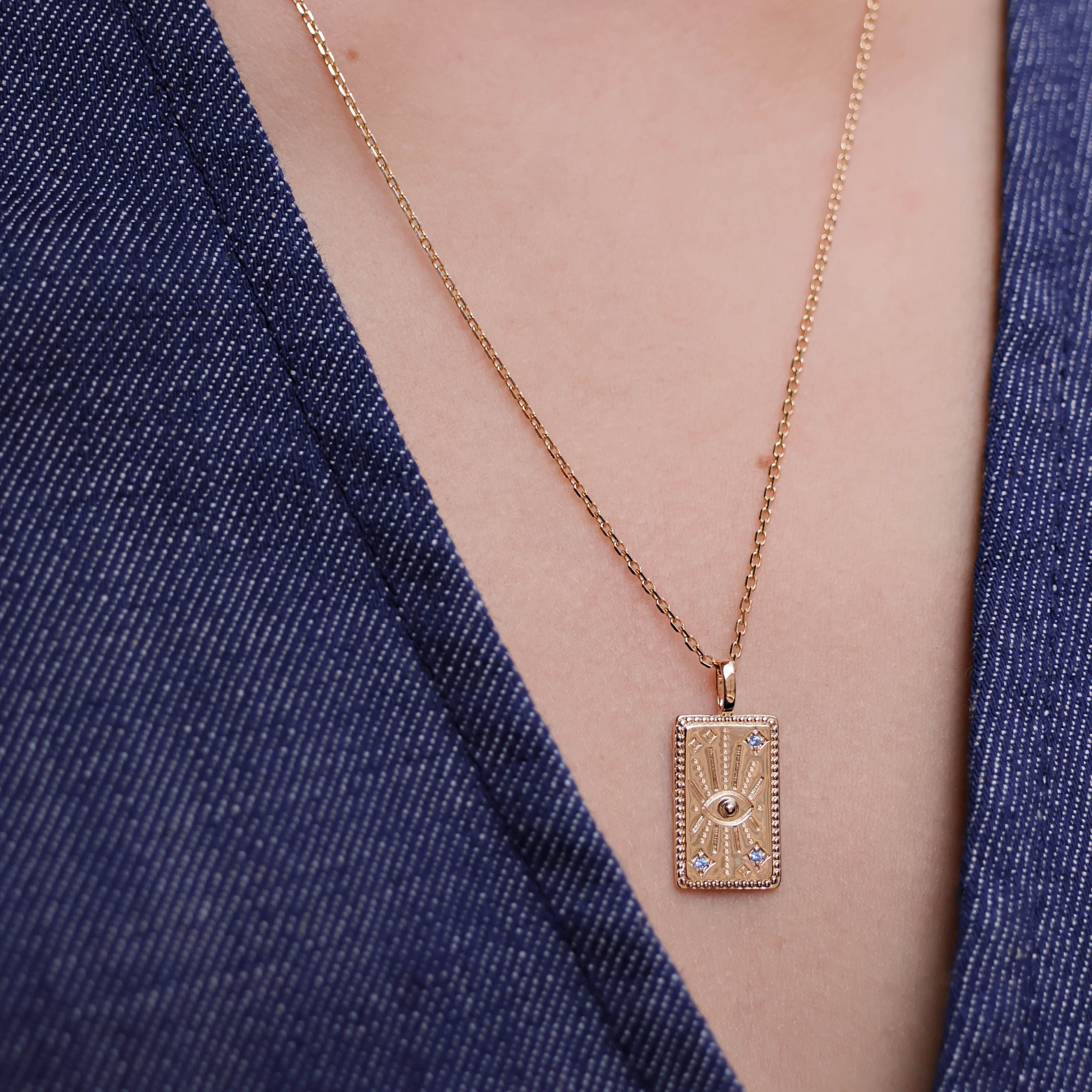 Protective eye tarot pendant with gold-plated blue oxides to engrave